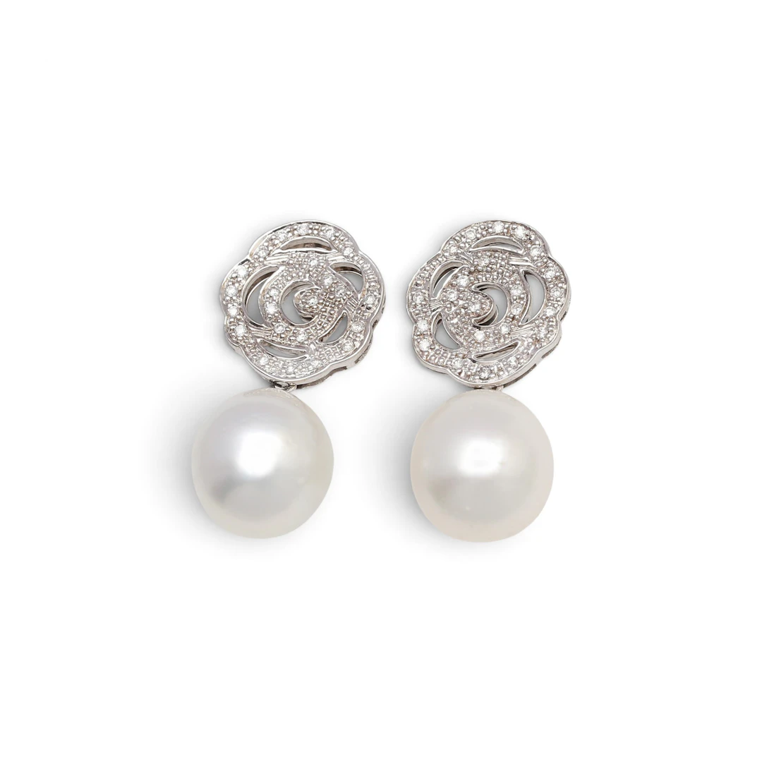TOUS. Diamonds and Australian pearls earrings.
