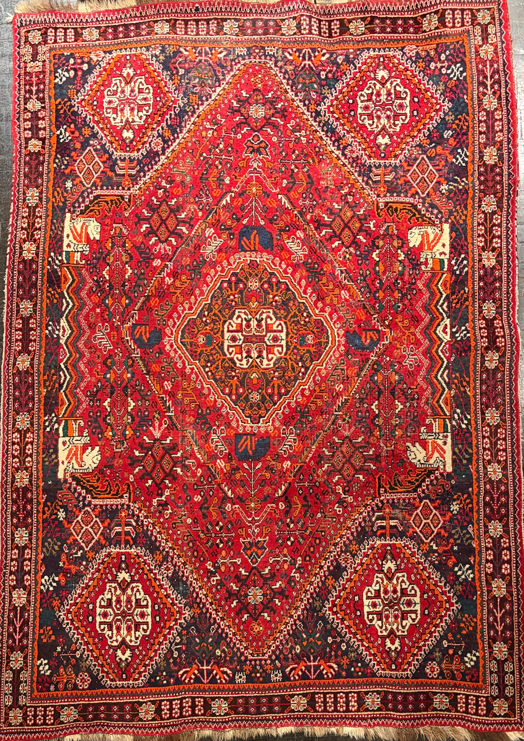 Persian wool rug with geometric motifs, 20th century.