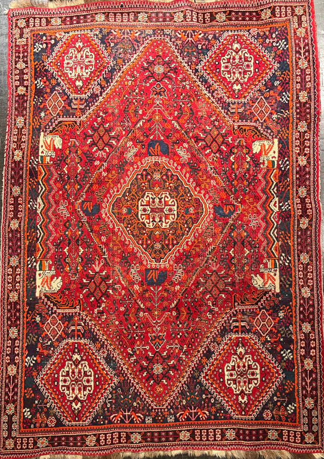 Persian wool rug with geometric motifs, 20th century.