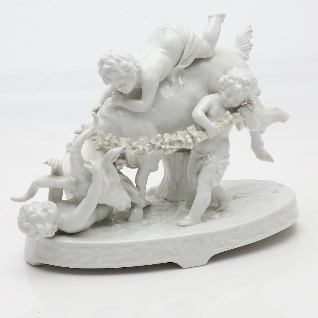"Bacchic children with a goat", glazed porcelain group by Müller &