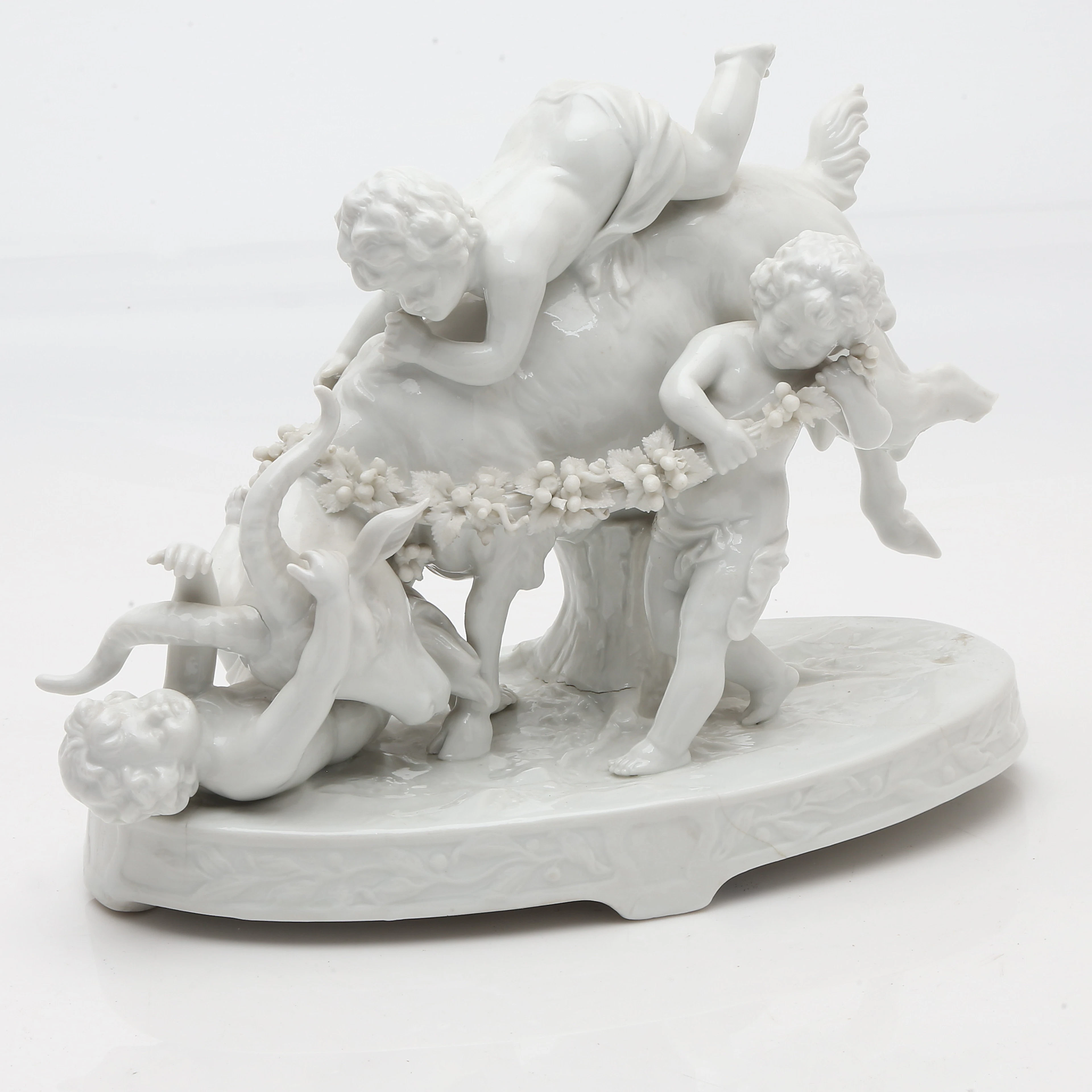 "Bacchic children with a goat", glazed porcelain group by Müller &