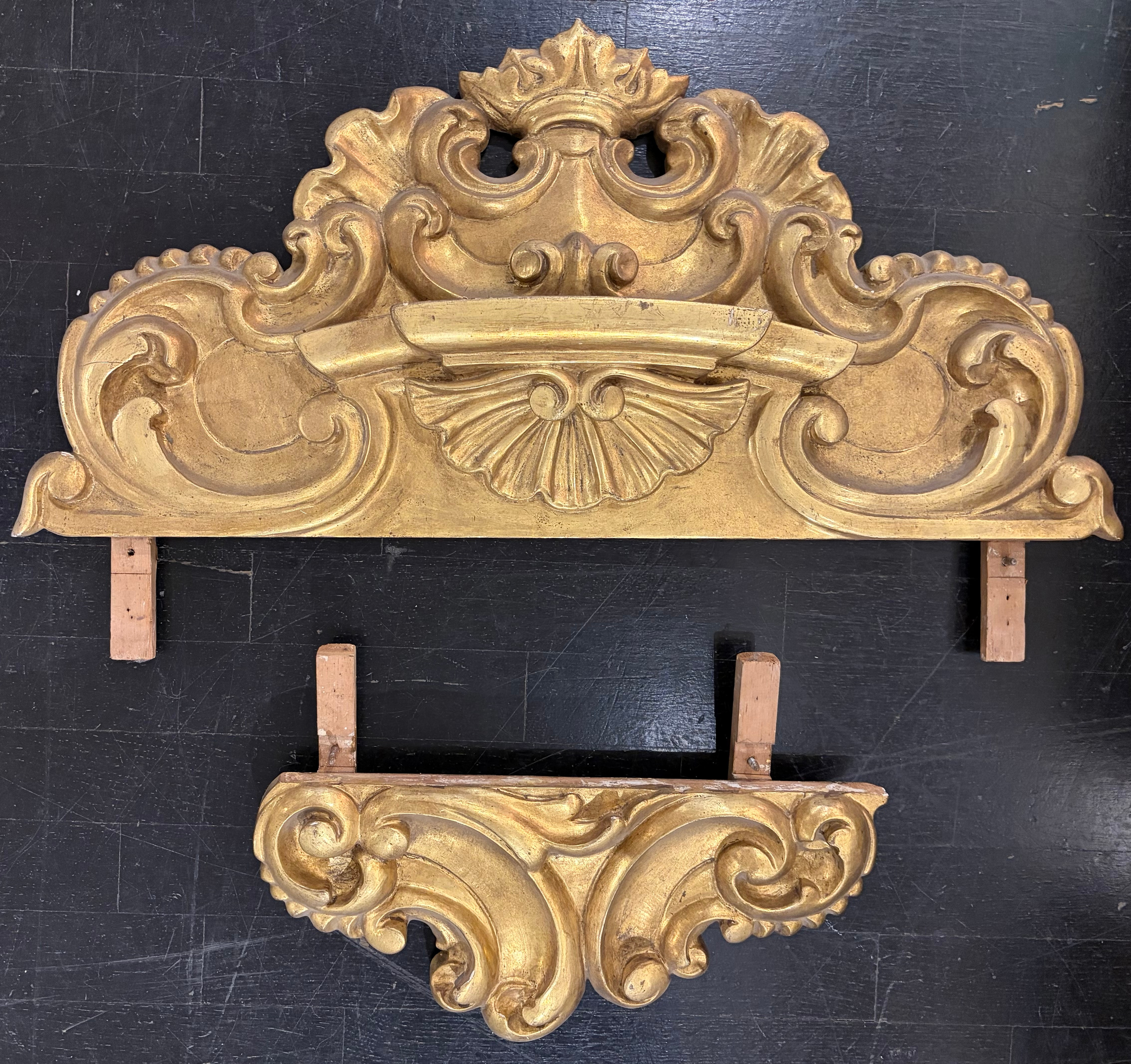Pair of carved and gilt wood frame finials, 19th Century.