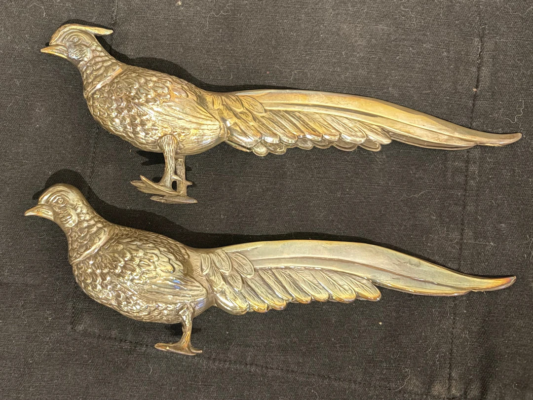 Pair of pheasants in silvery metal, mid 20th Century.
