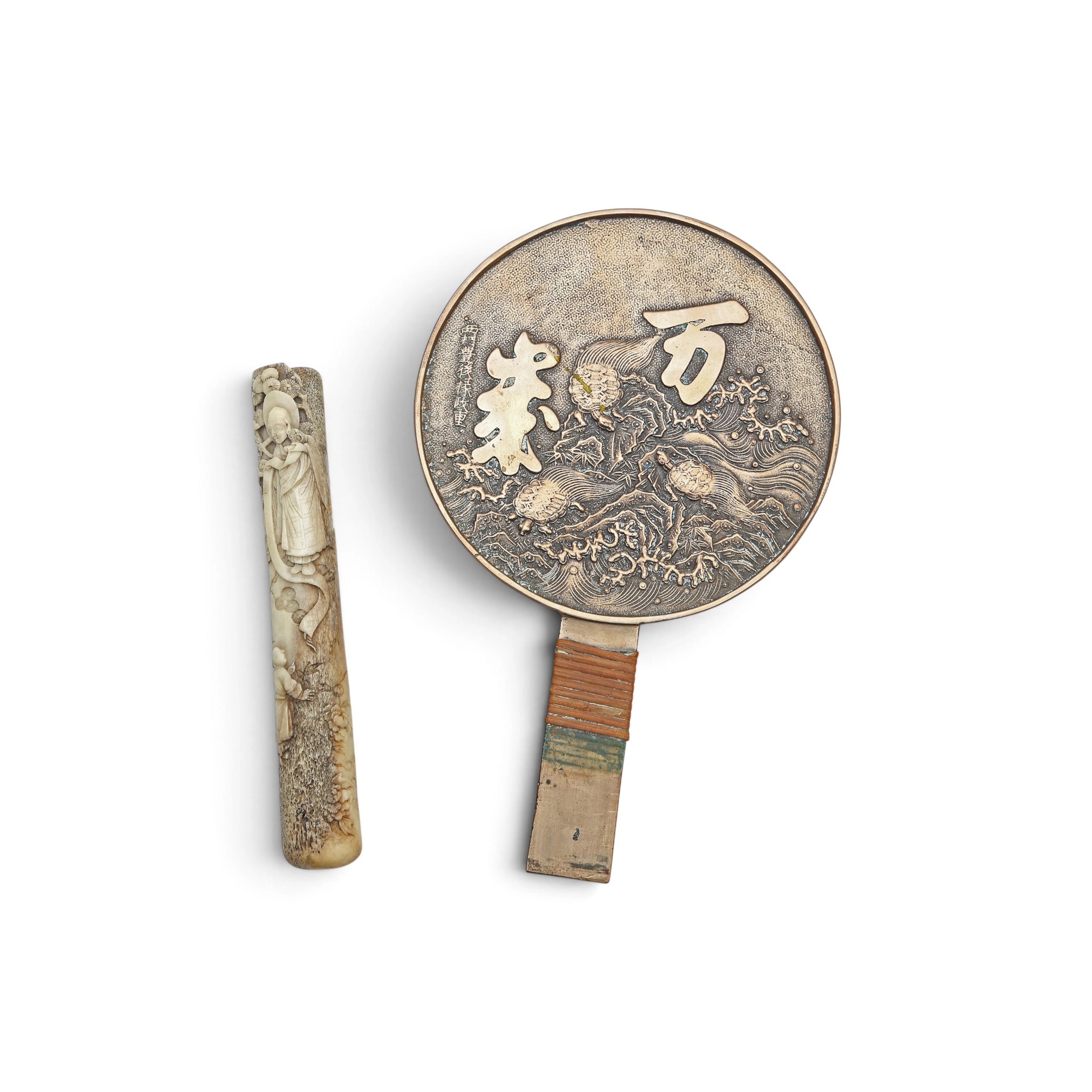 Japanese "makyo" mirror in bronze and "wari-zutsu" carved bone, late