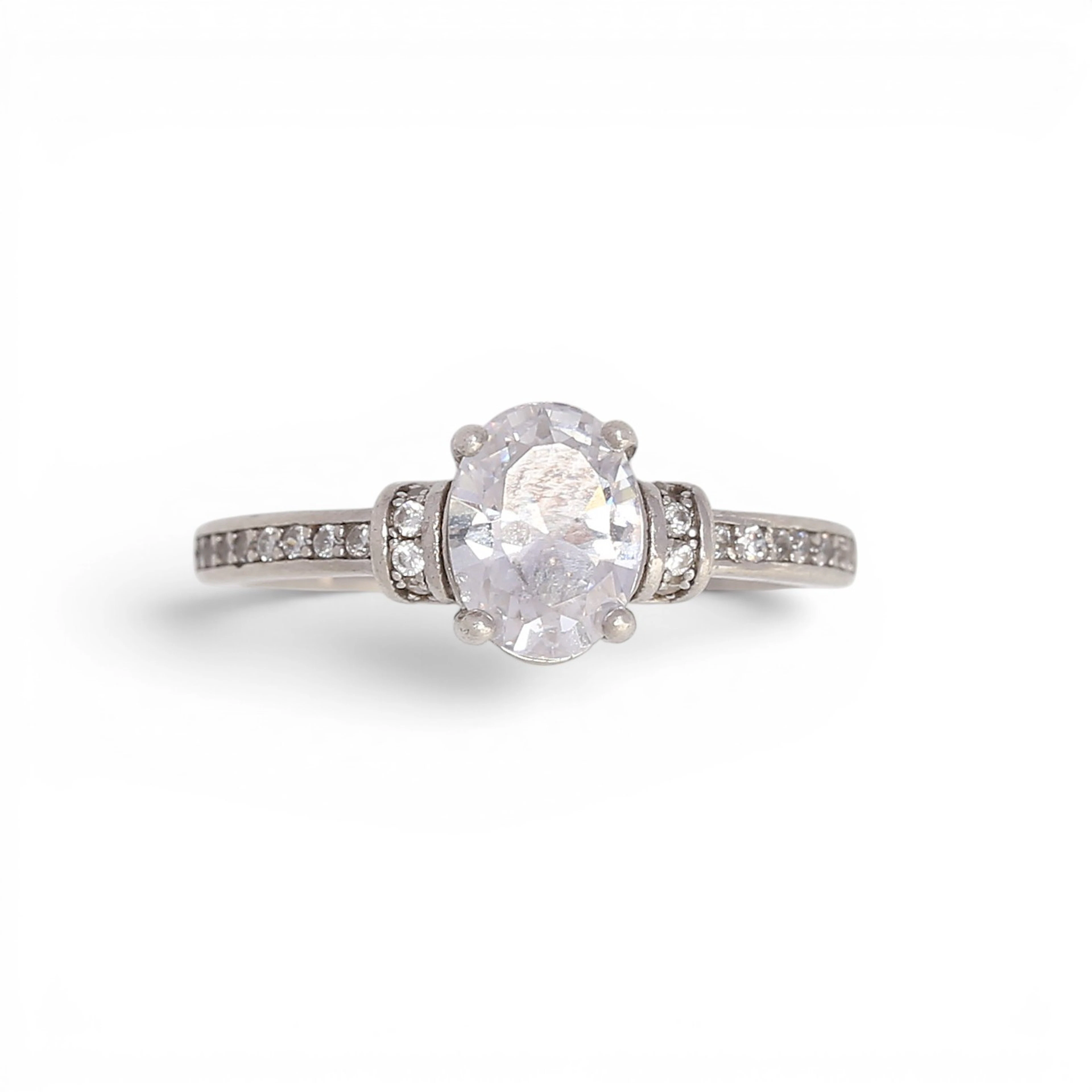 Zircons solitaire ring.