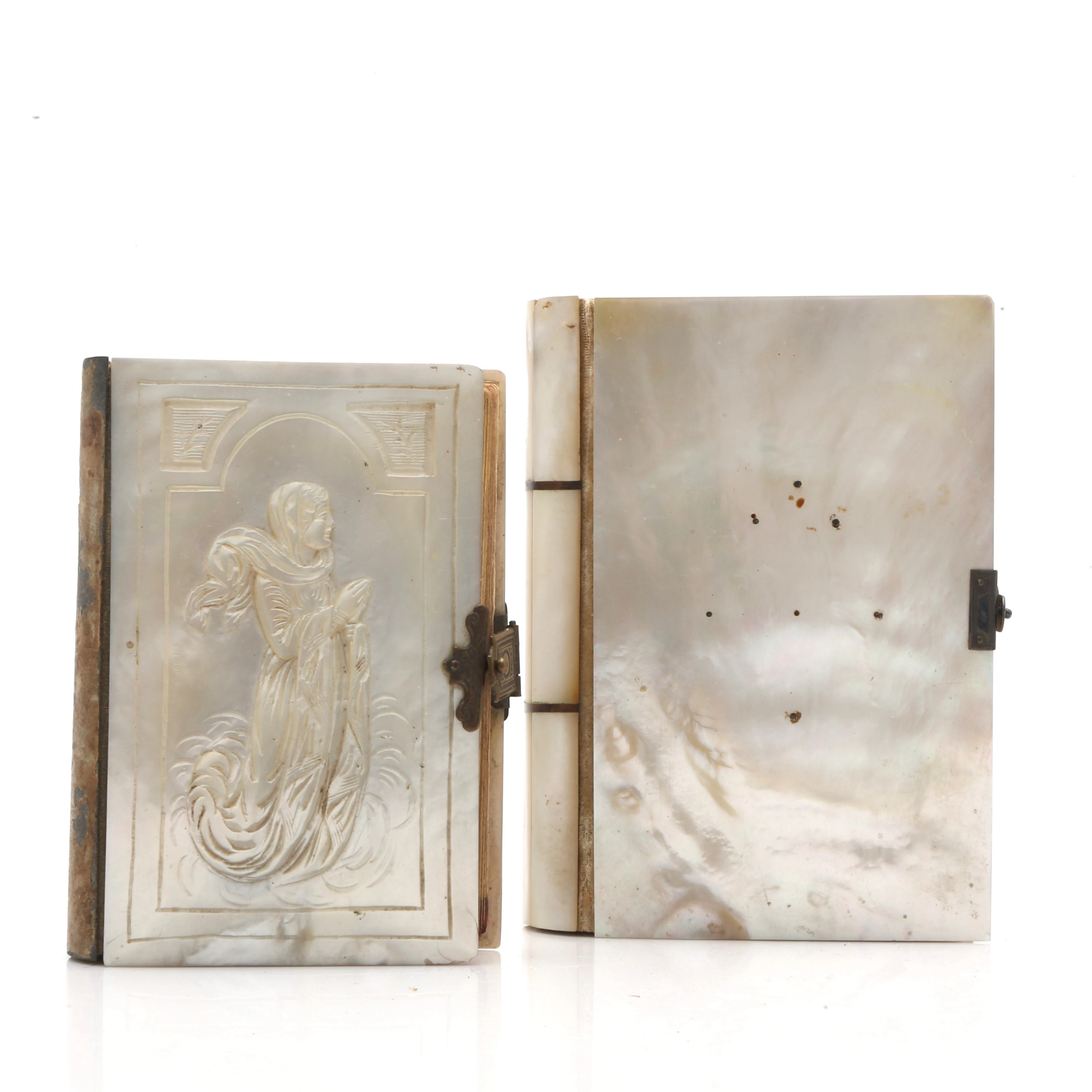 Two prayer books with mother-of-pearl, silver and nacre bindings, 19th Century.