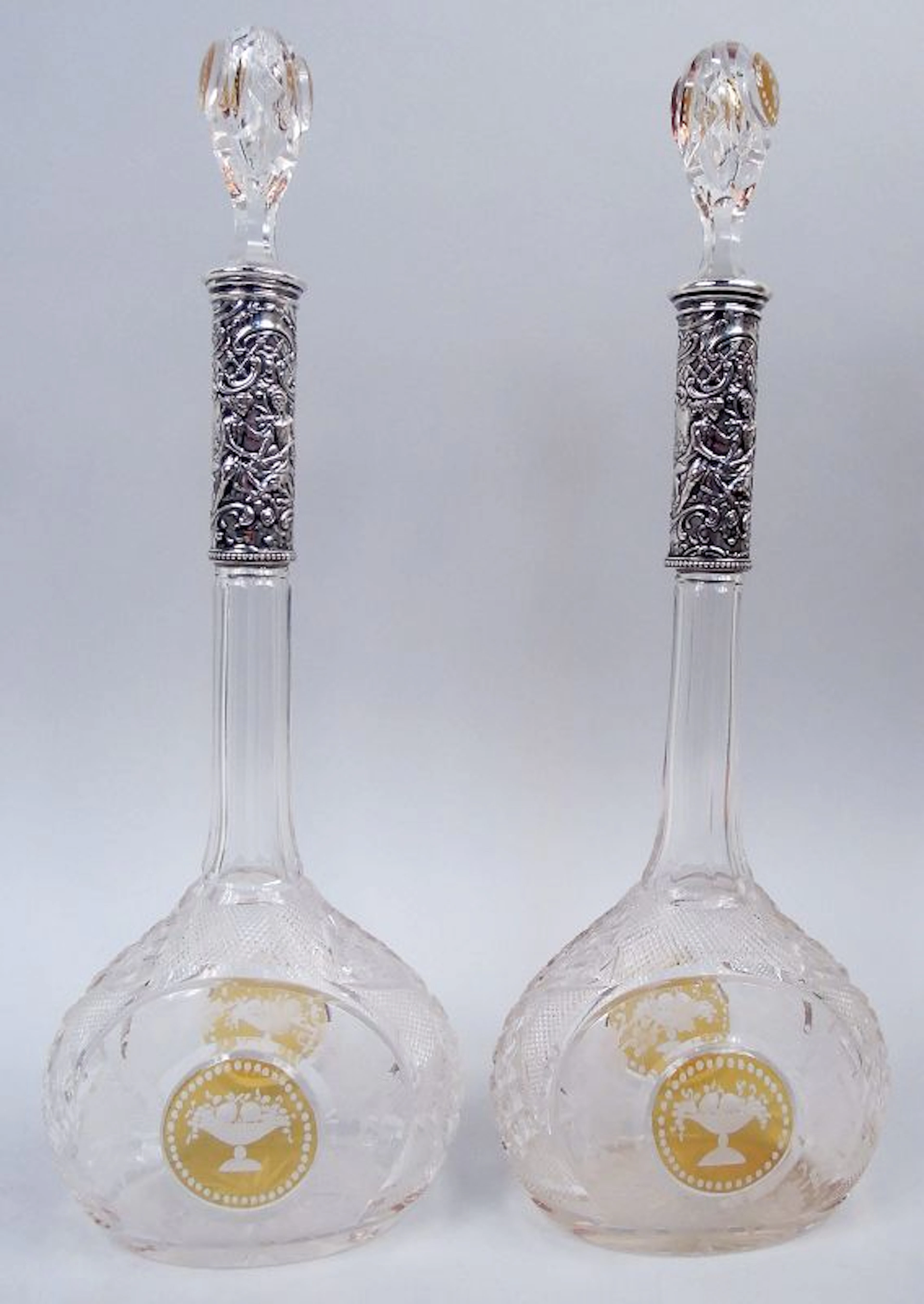 Pair of European Amber Glass & Silver 15-Inch Bottle Decanters