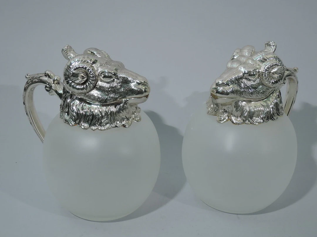 Pair of Neoclassical Camphor Glass Decanters with Rams' Heads