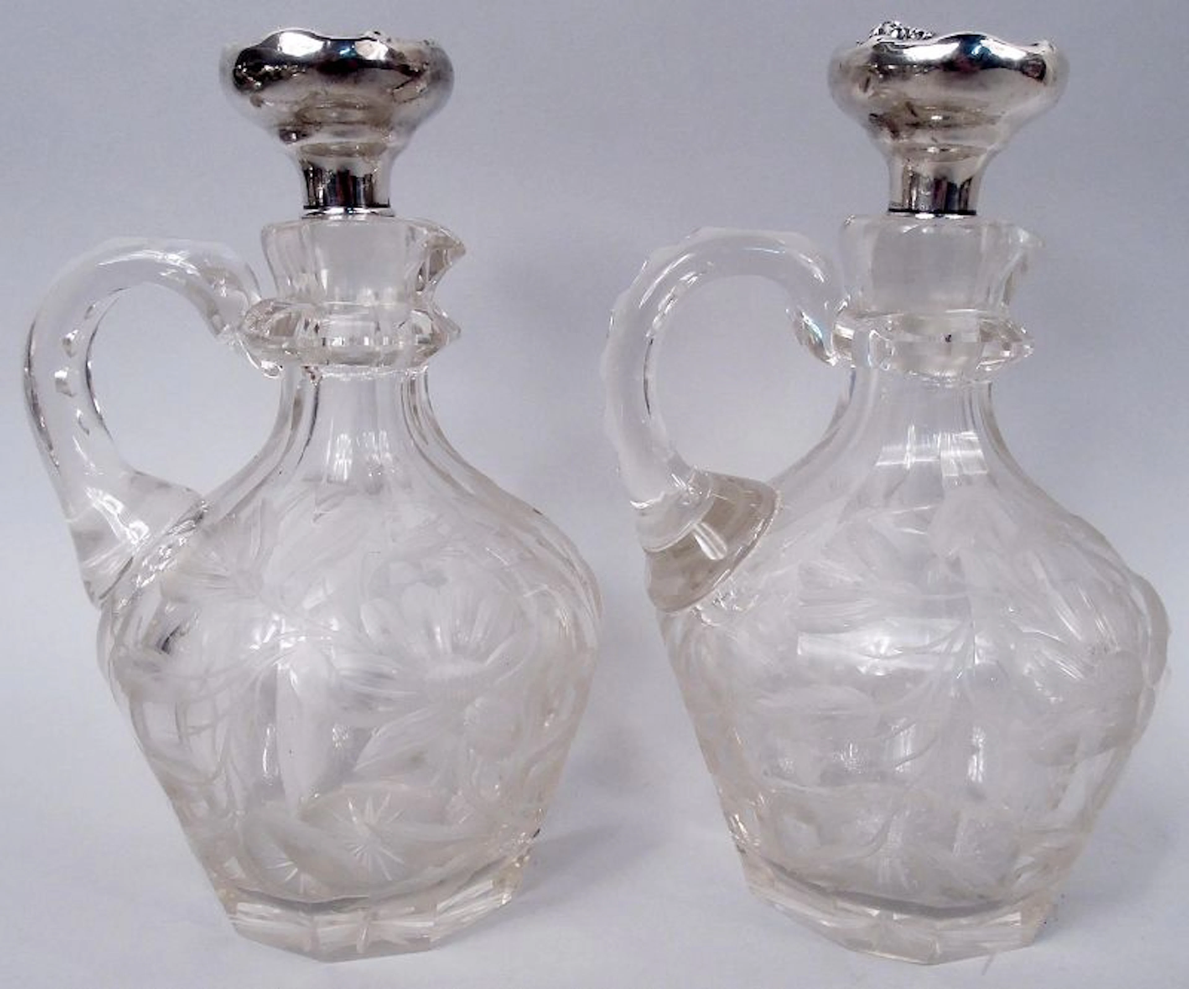 Pair of American Art Nouveau Sterling Silver & Cut Glass Decanters