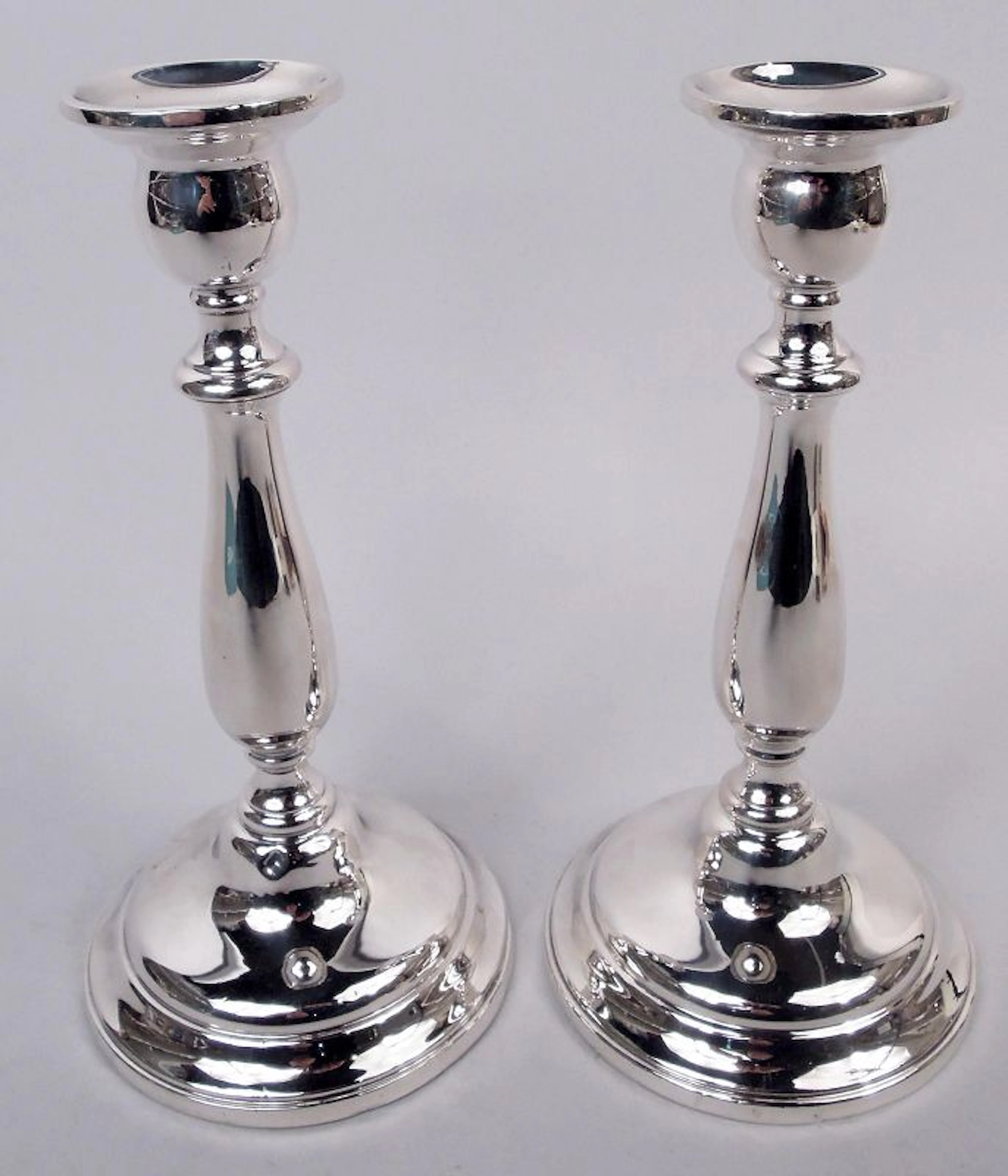 Pair of Traditional American Colonial Sterling Silver Candlesticks