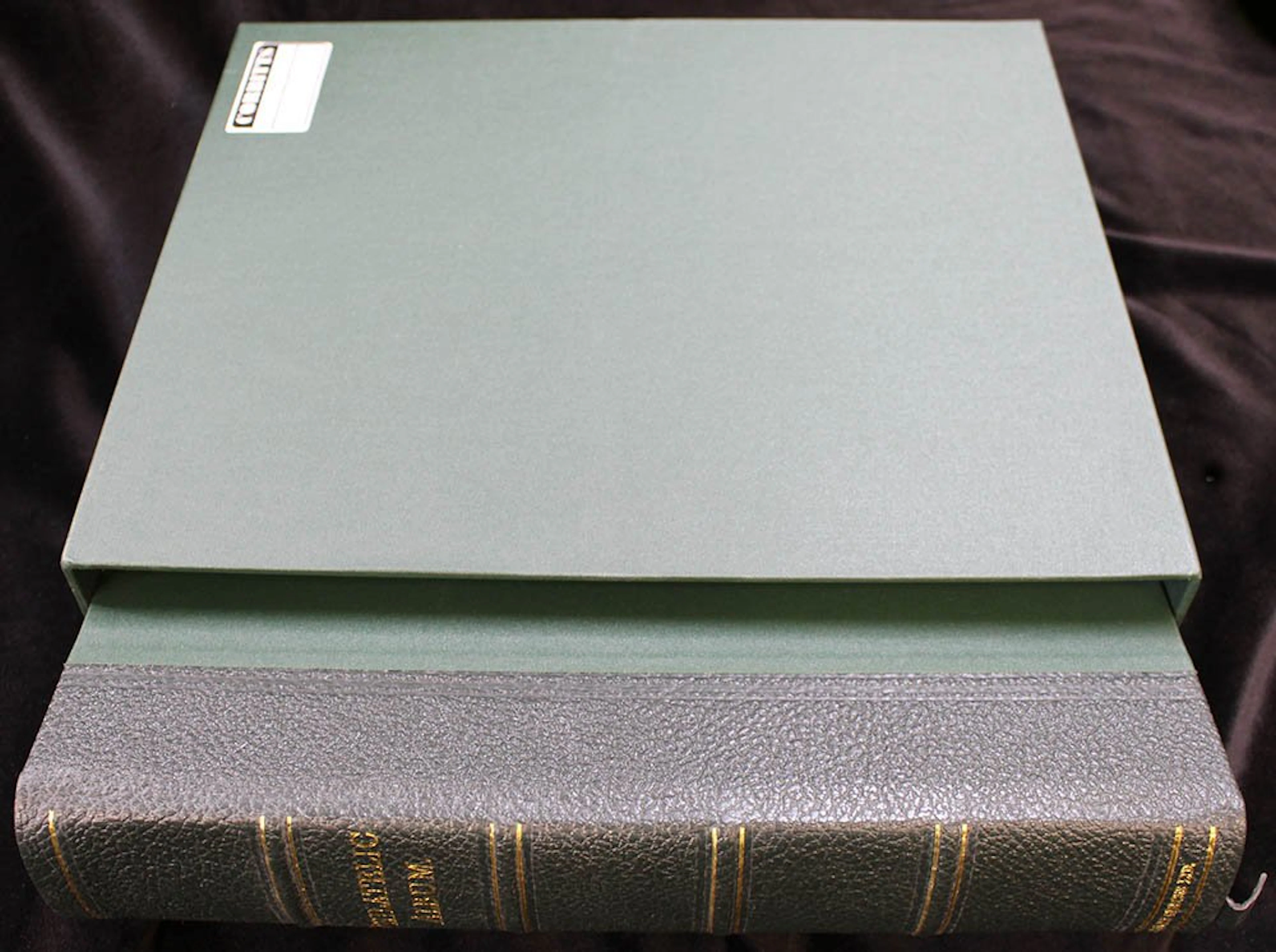 PHILATELIC ALBUM (large green album with slip case)...