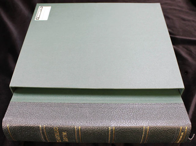 PHILATELIC ALBUM (large green album with slip case)...