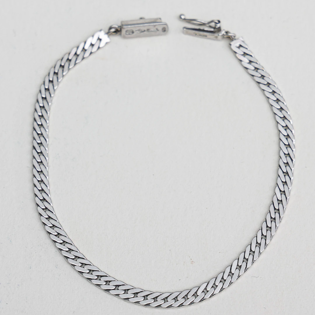 ARMBAND , 750, Uno A Erre,18 karat vitguld,Italien , vikt ca 9,07 gram.