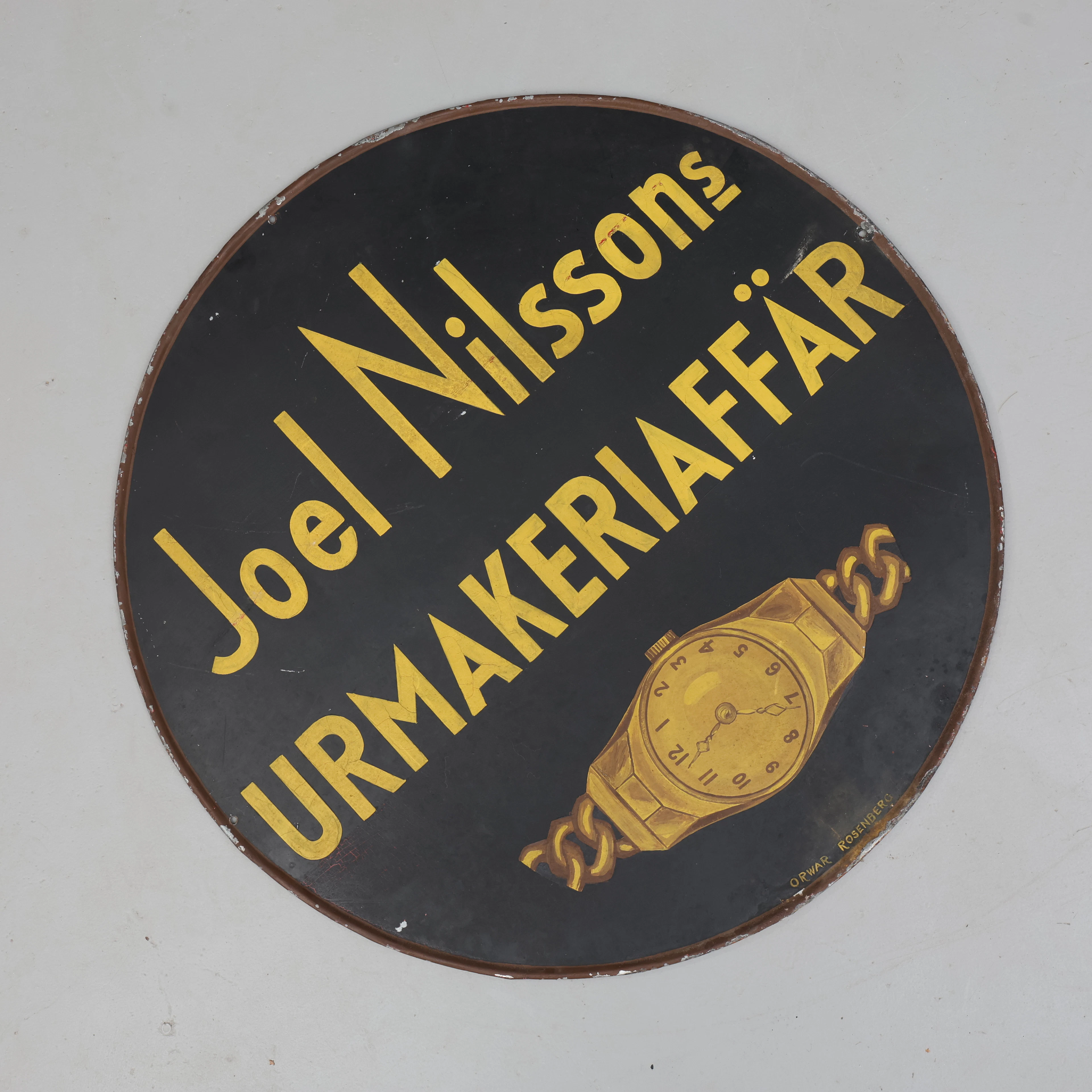 SKYLT, "Joel Nilssons Urmakeriaffär".