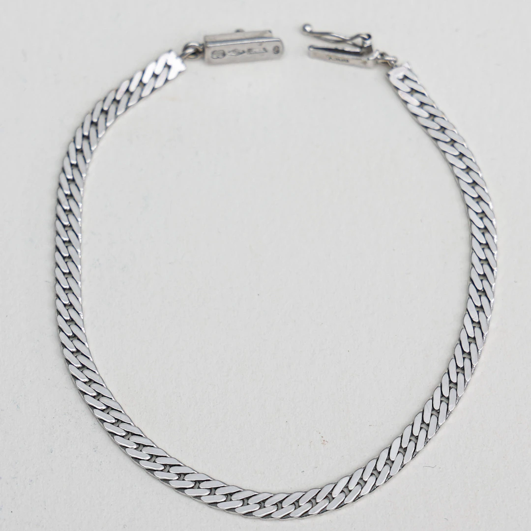 ARMBAND , 750, Uno A Erre,18 karat vitguld,Italien , vikt ca 9,07 gram.