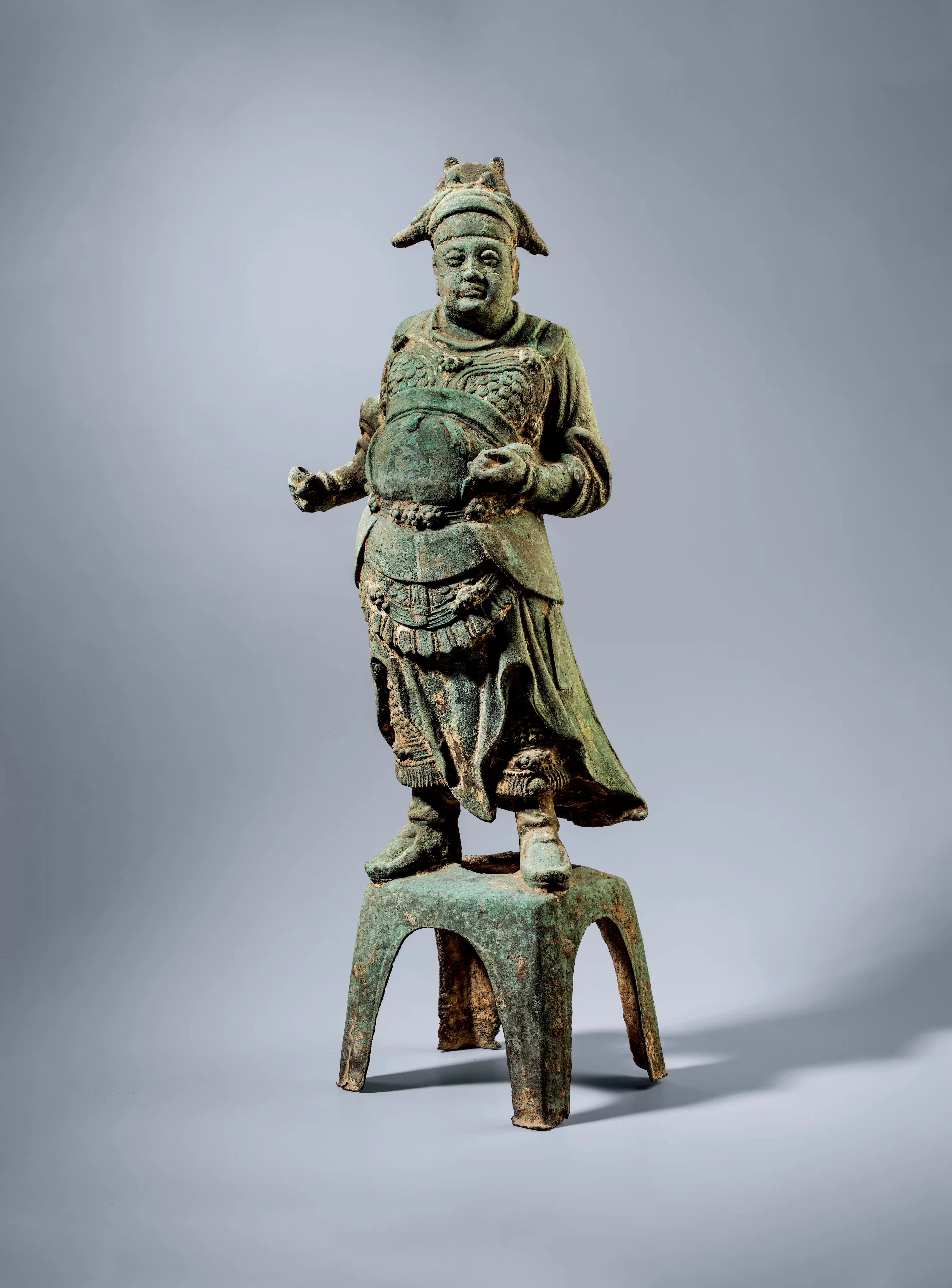 A BRONZE STANDING FIGURE OF A MILITARY OFFICIAL, MING DYNASTY, 14TH-17TH