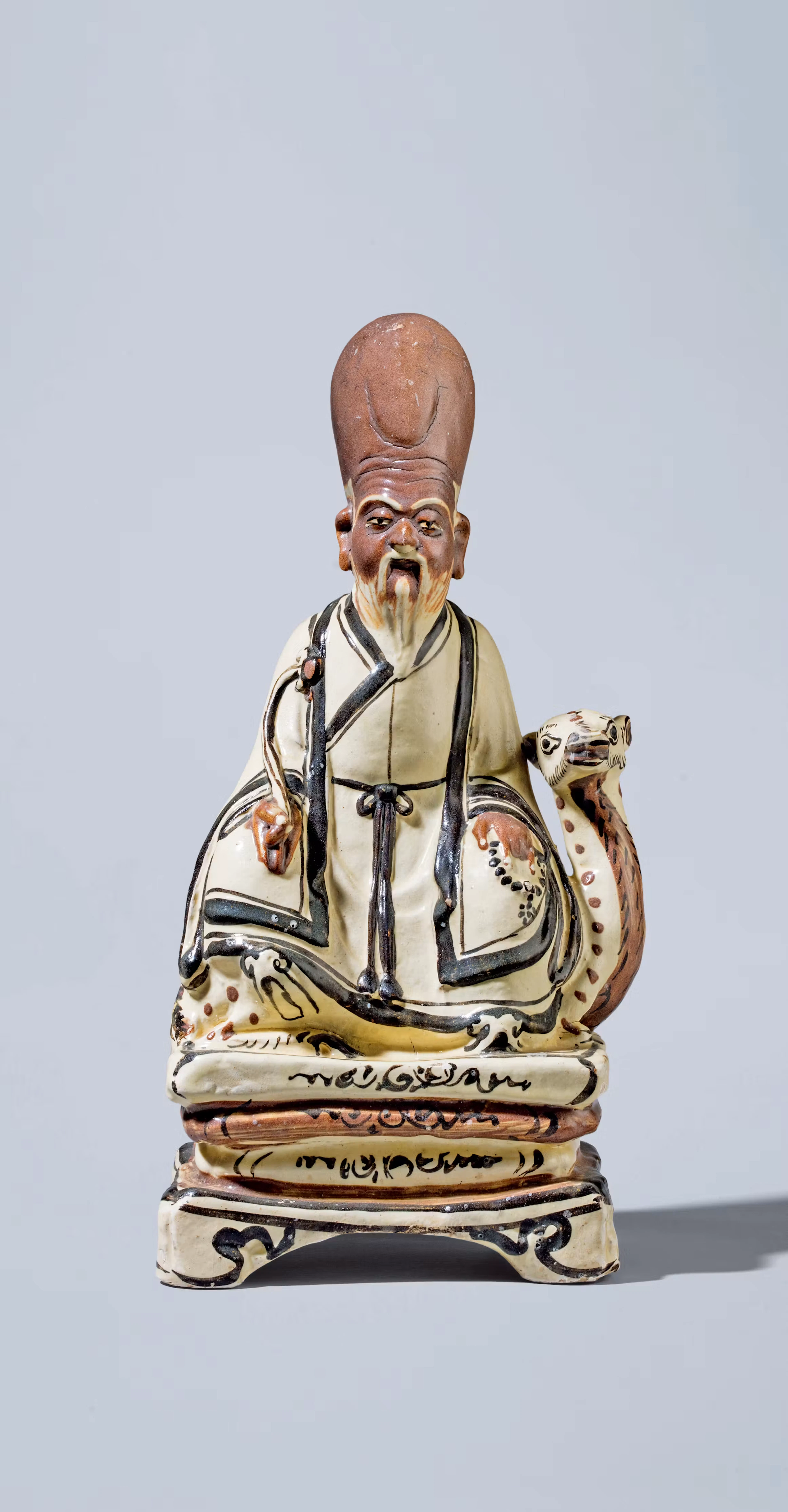 A CIZHOU SEATED FIGURE OF SHOULAO, MING DYNASTY, 14TH-17TH CENTURY