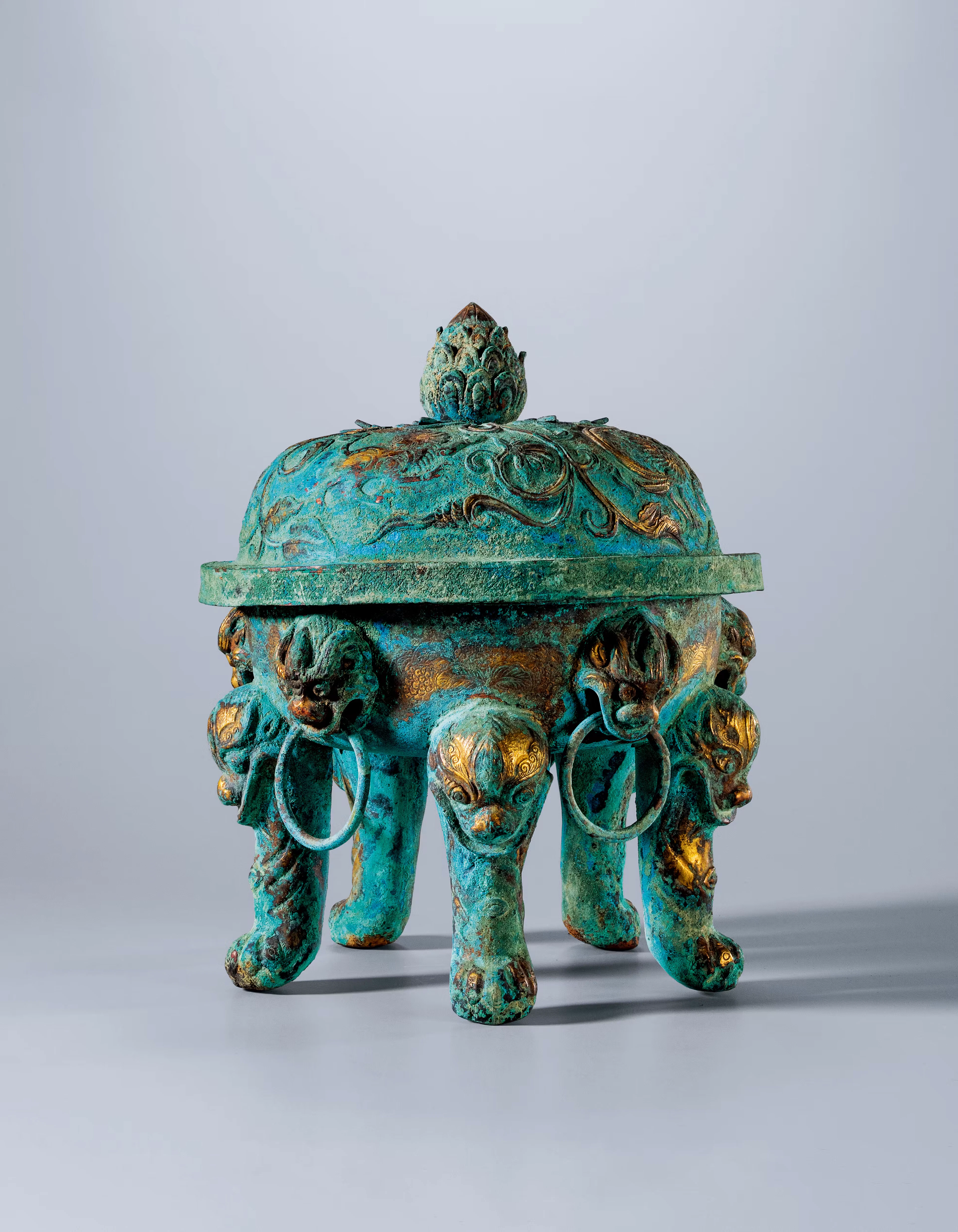 A GILT-BRONZE 'ANIMAL MASK' INCENSE BURNER AND COVER, TANG DYNASTY, 618-907