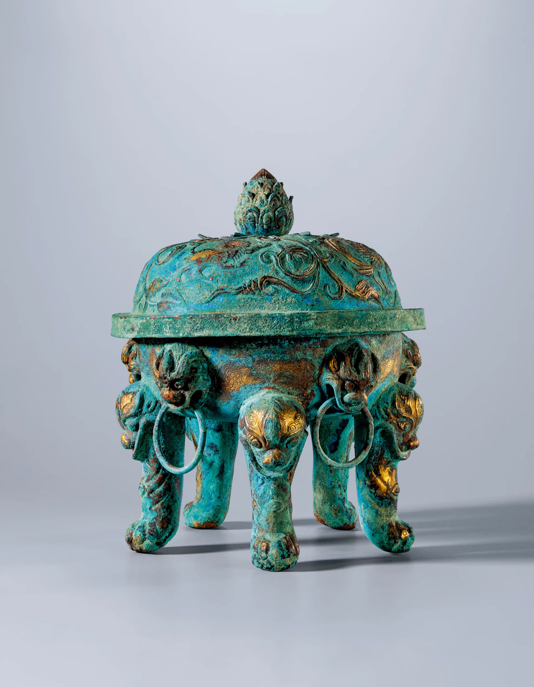 A GILT-BRONZE 'ANIMAL MASK' INCENSE BURNER AND COVER, TANG DYNASTY, 618-907