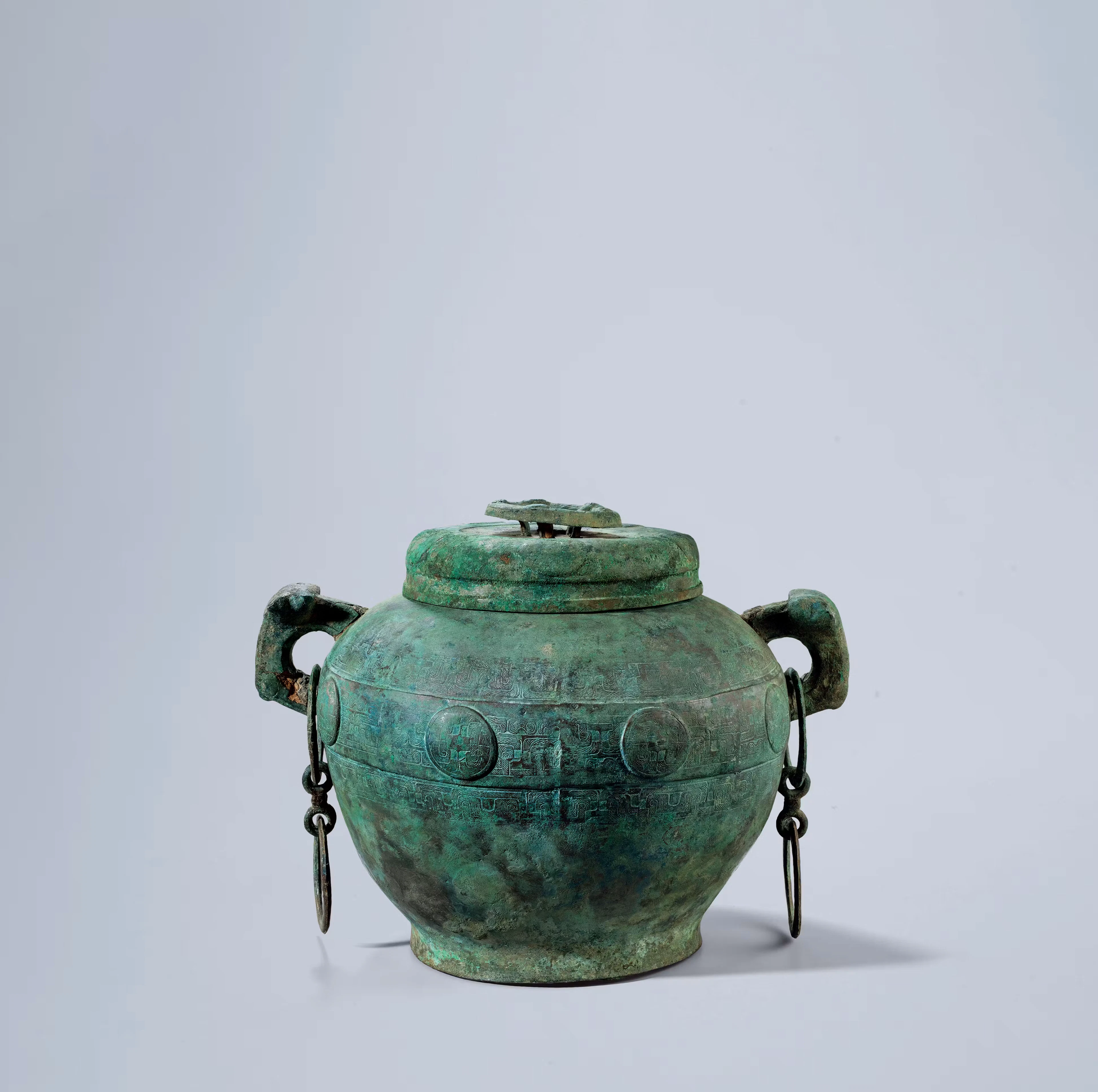 AN ARCHAIC BRONZE WINE VESSEL, FOU, SPRING & AUTUMN PERIOD, 770-475 B.C.