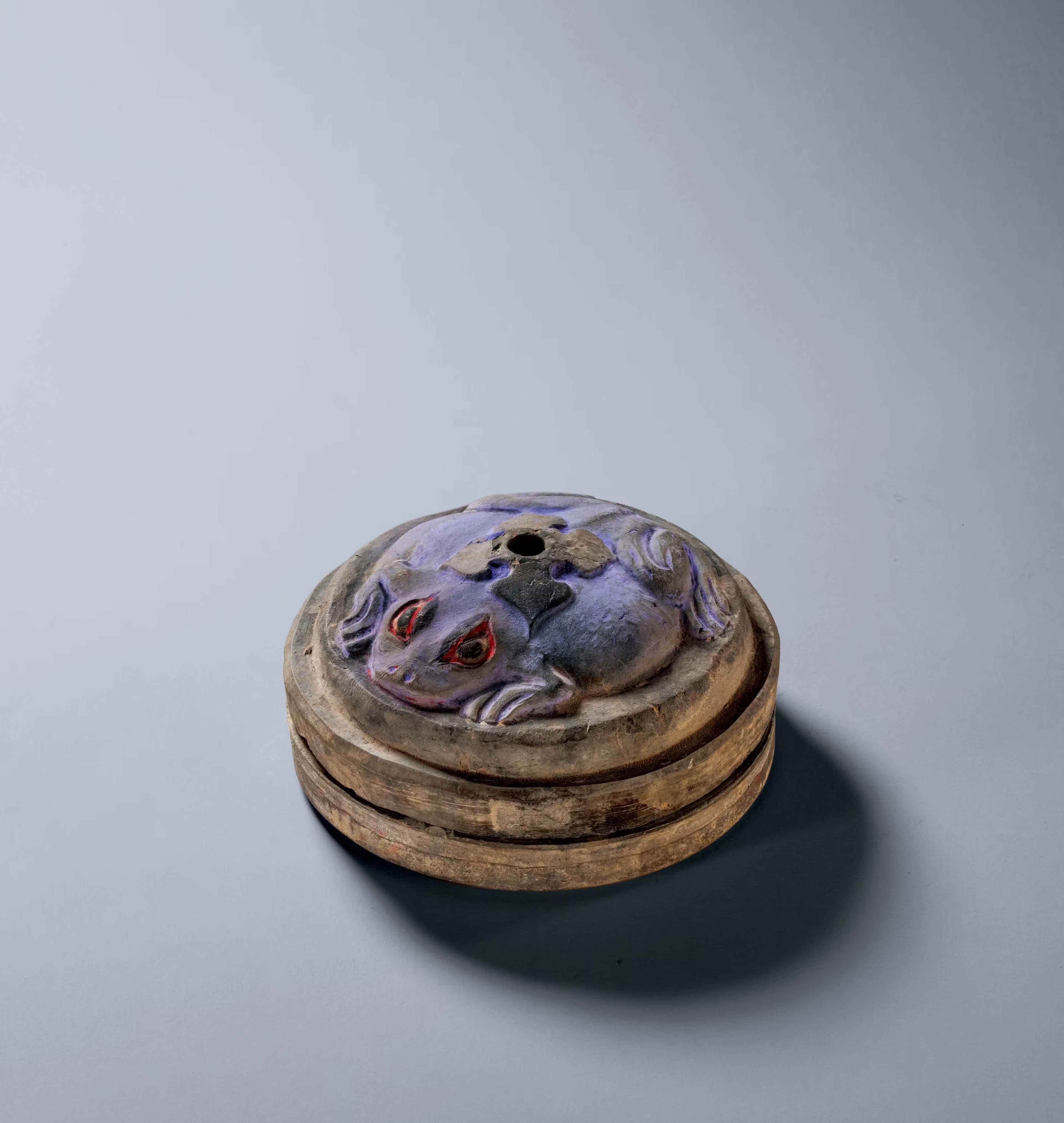 A PAINTED 'TOAD' MIRROR BOX AND COVER, EASTERN HAN DYNASTY, A.D. 25-220