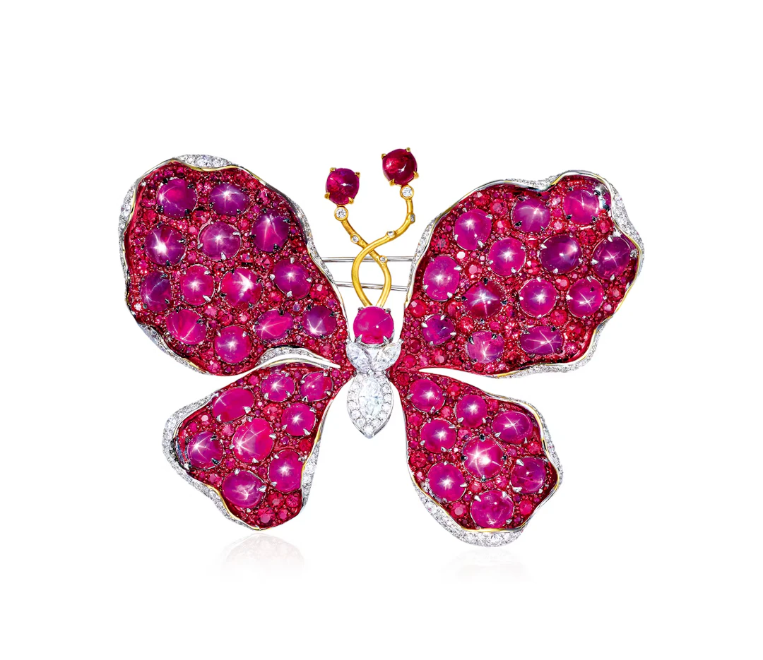 TOTAL OF 50.38 CARAT BURMESE MOGOK RUBY AND DIAMOND 'BUTTERFLY' BROOCH