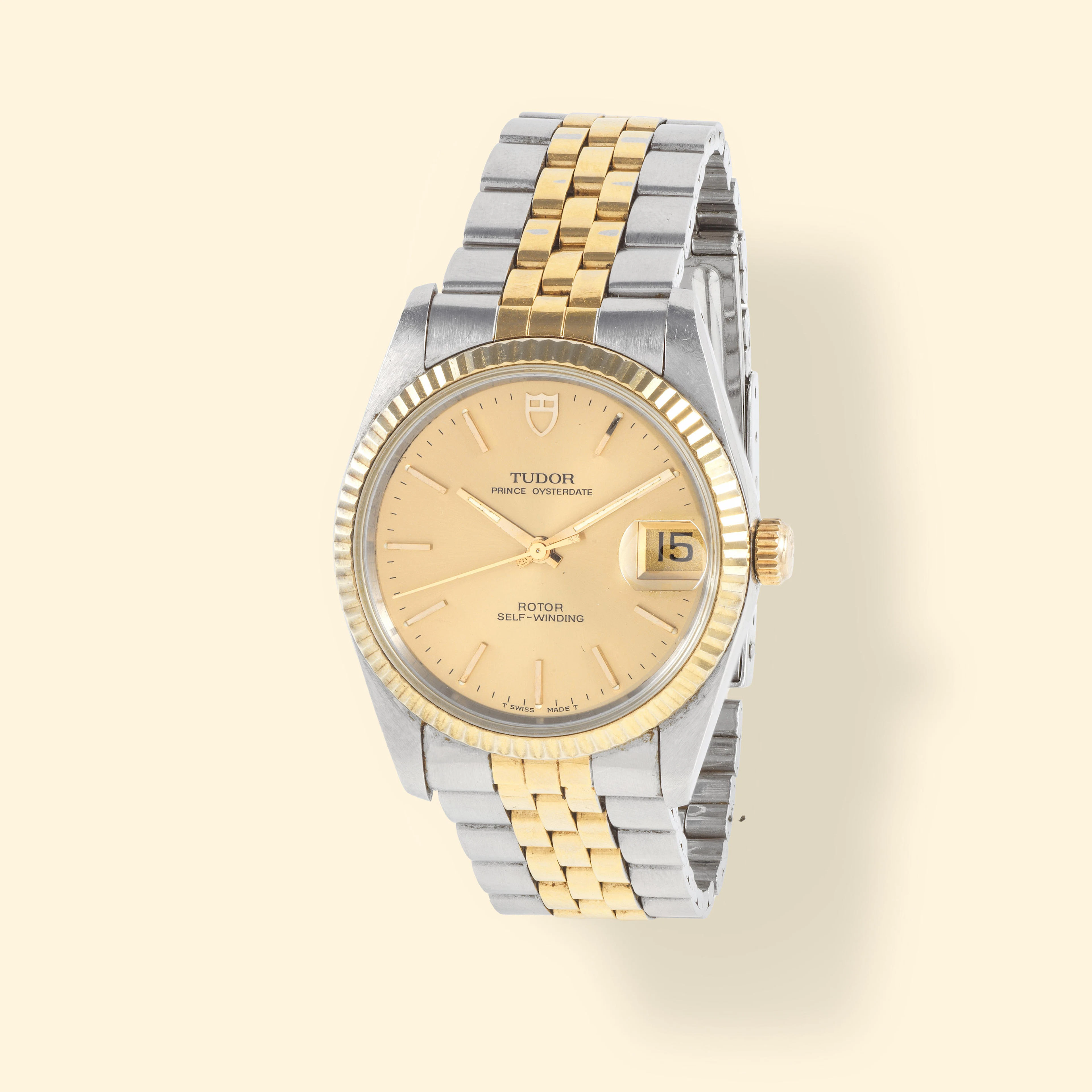 Tudor. A stainless steel and gold plated automatic calendar bracelet