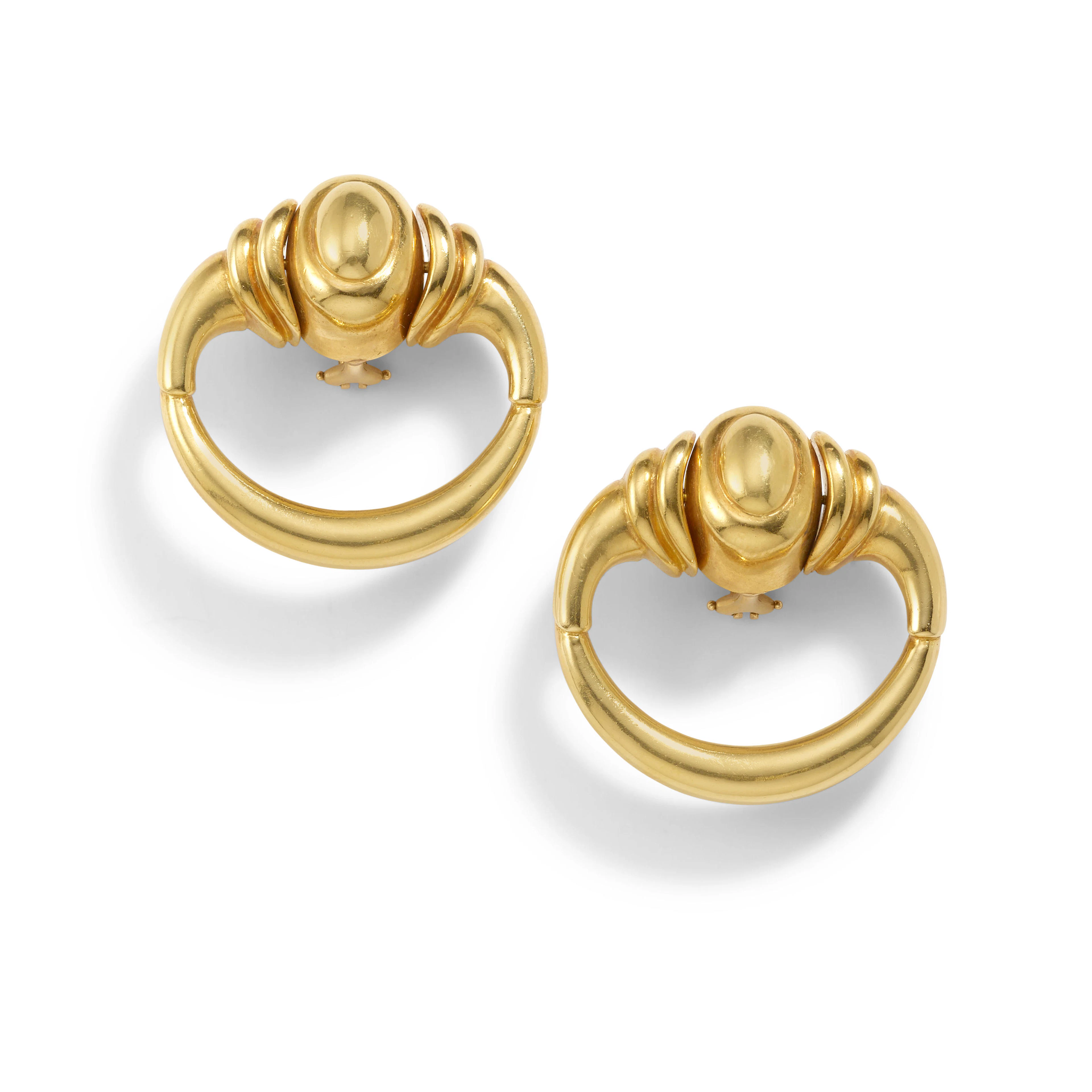 ALDO CIPULLO FOR CARTIER: A PAIR OF 18K GOLD EARCLIPS, 1972