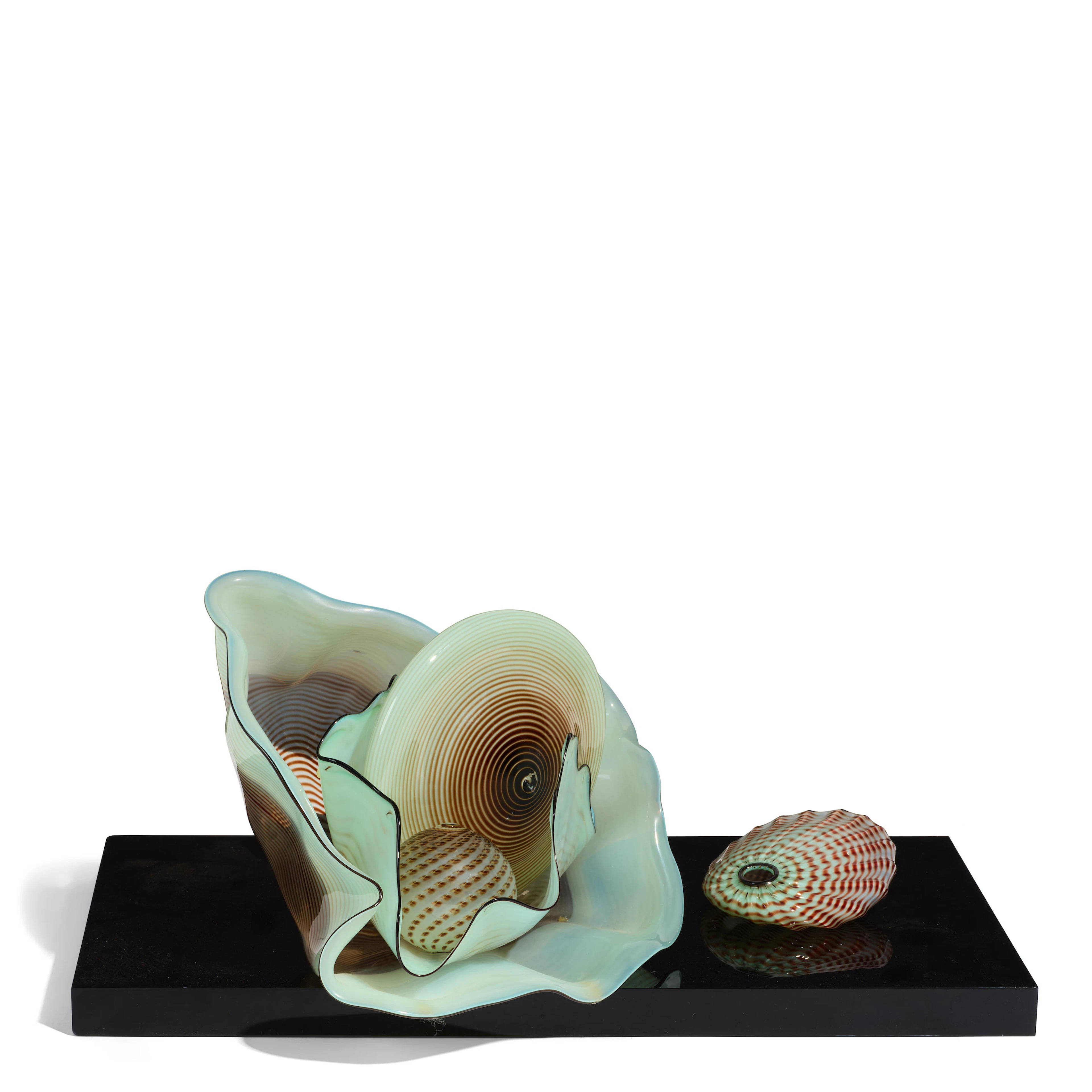 DALE CHIHULY (BORN 1941) Five-Piece Celadon Seaform Set with Oxblood