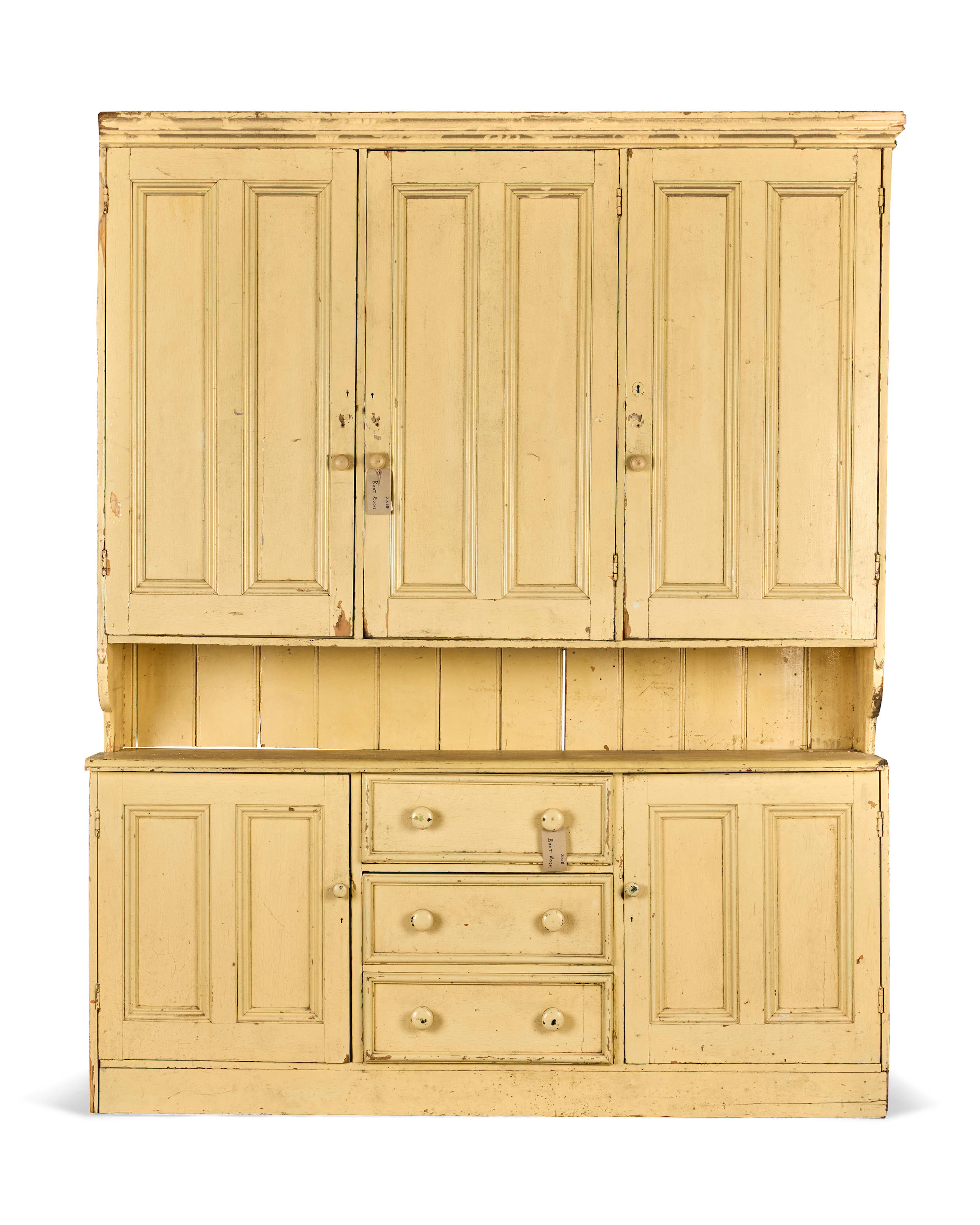 A large Victorian and later cream painted pine housekeeper's cupboardAcquired