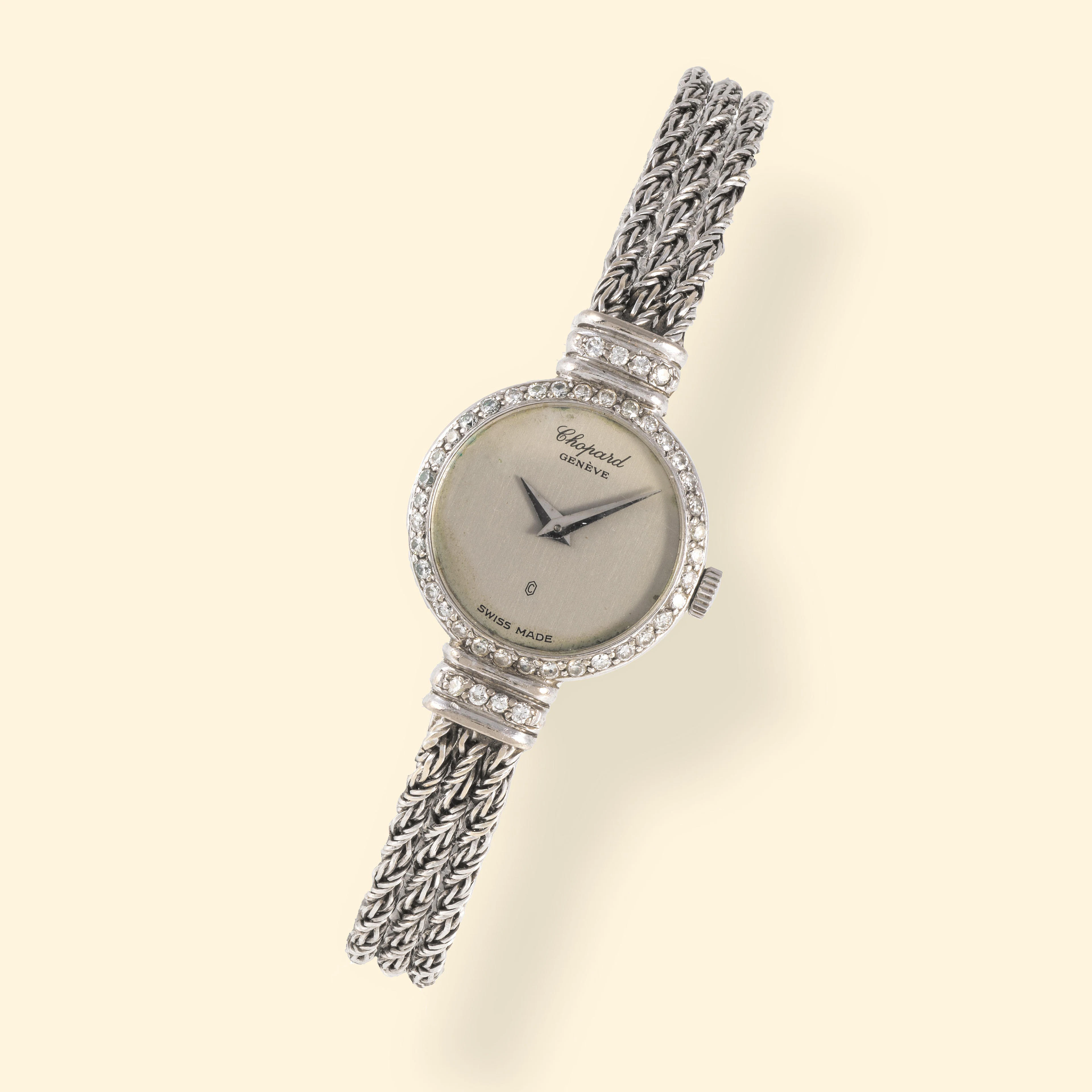 Chopard. A lady's 18K white gold quartz bracelet watch with diamond