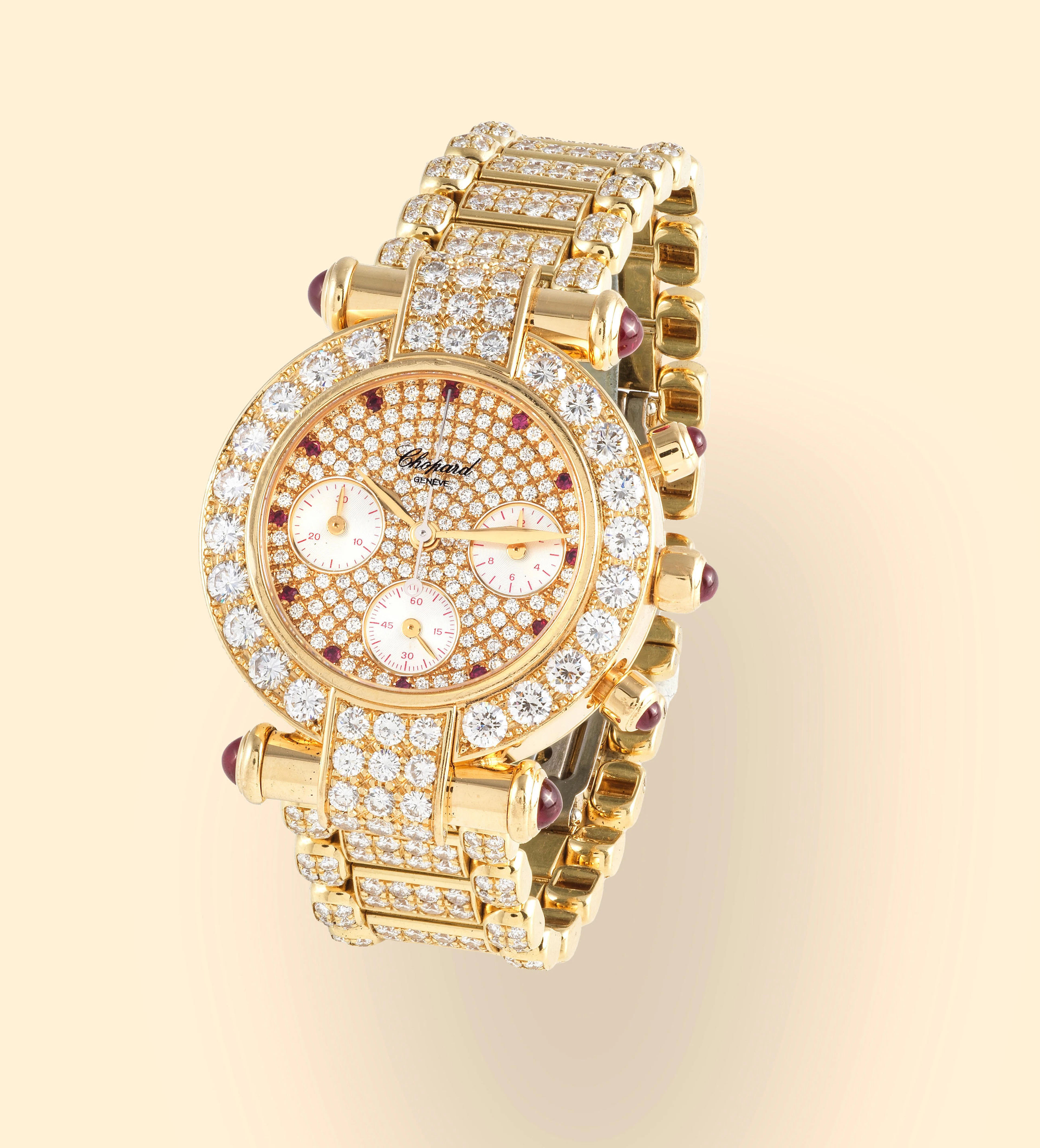 Chopard. An 18K gold quartz chronograph bracelet watch with diamonds