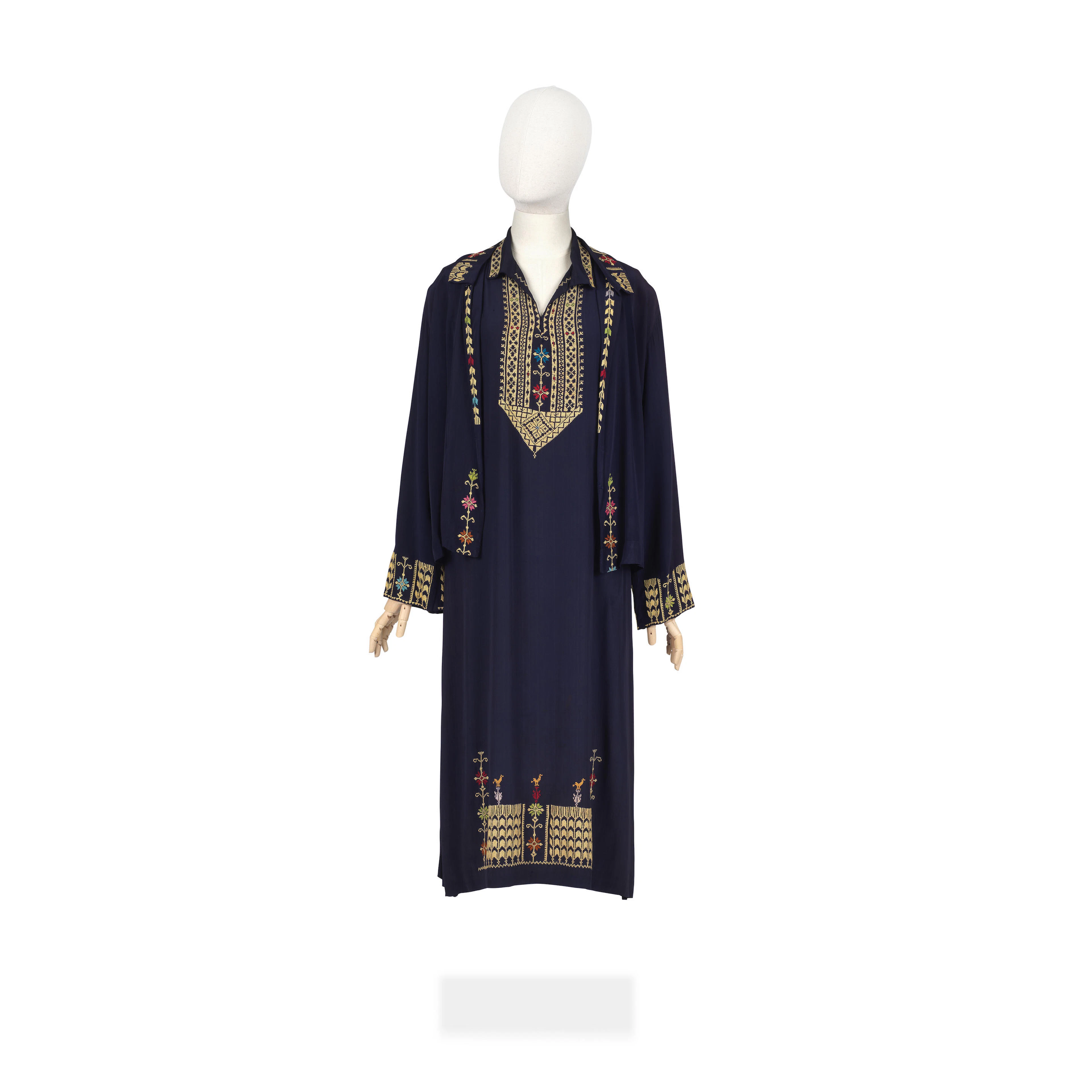 Laura Carmichael (as Lady Edith): Blue dress and blouse with Aztec-style