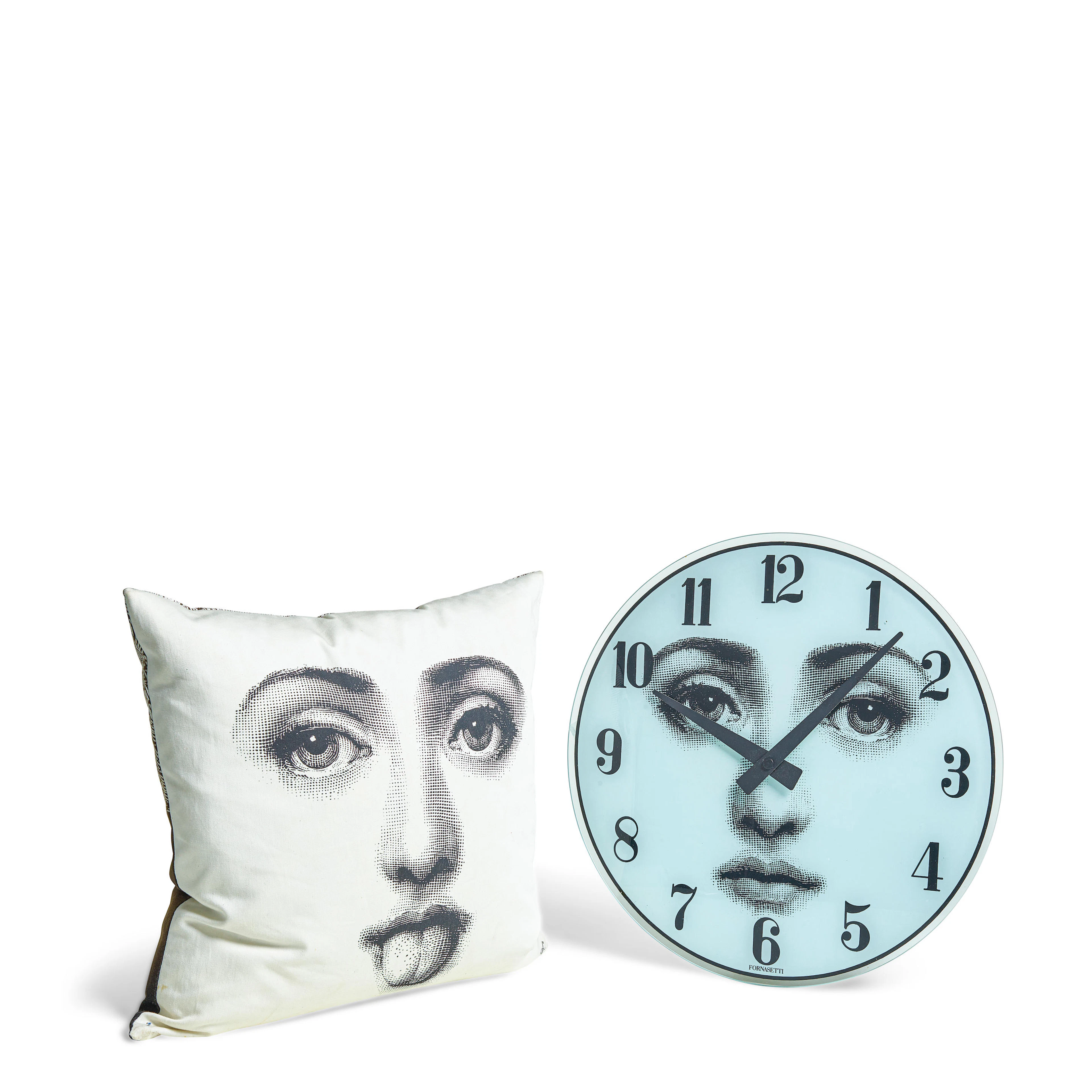 PIERO FORNASETTI (ITALIAN, 1913-1988): A WALL CLOCK AND A PILLOWContemporary
