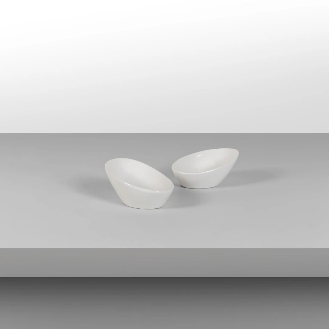 FRANCO MENEGUZZO, DANESE, 1956. Due ciotole. Ceramica smaltata. Loghi