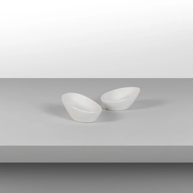 FRANCO MENEGUZZO, DANESE, 1956. Due ciotole. Ceramica smaltata. Loghi