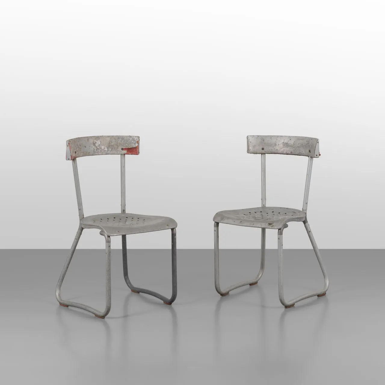 GIO PONTI, 1935. Due sedie per gli uffici Montecatini. Alluminio.
