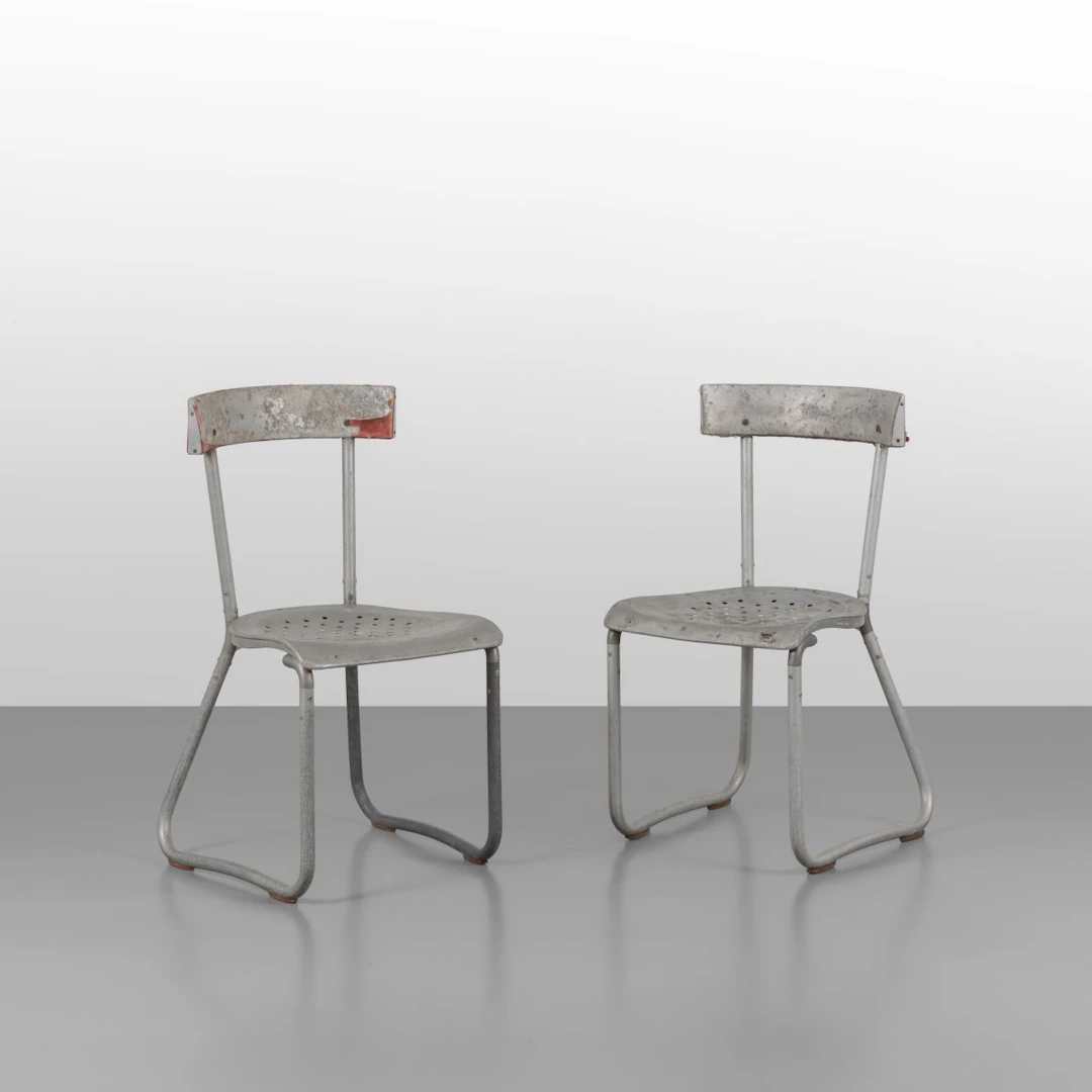 GIO PONTI, 1935. Due sedie per gli uffici Montecatini. Alluminio.