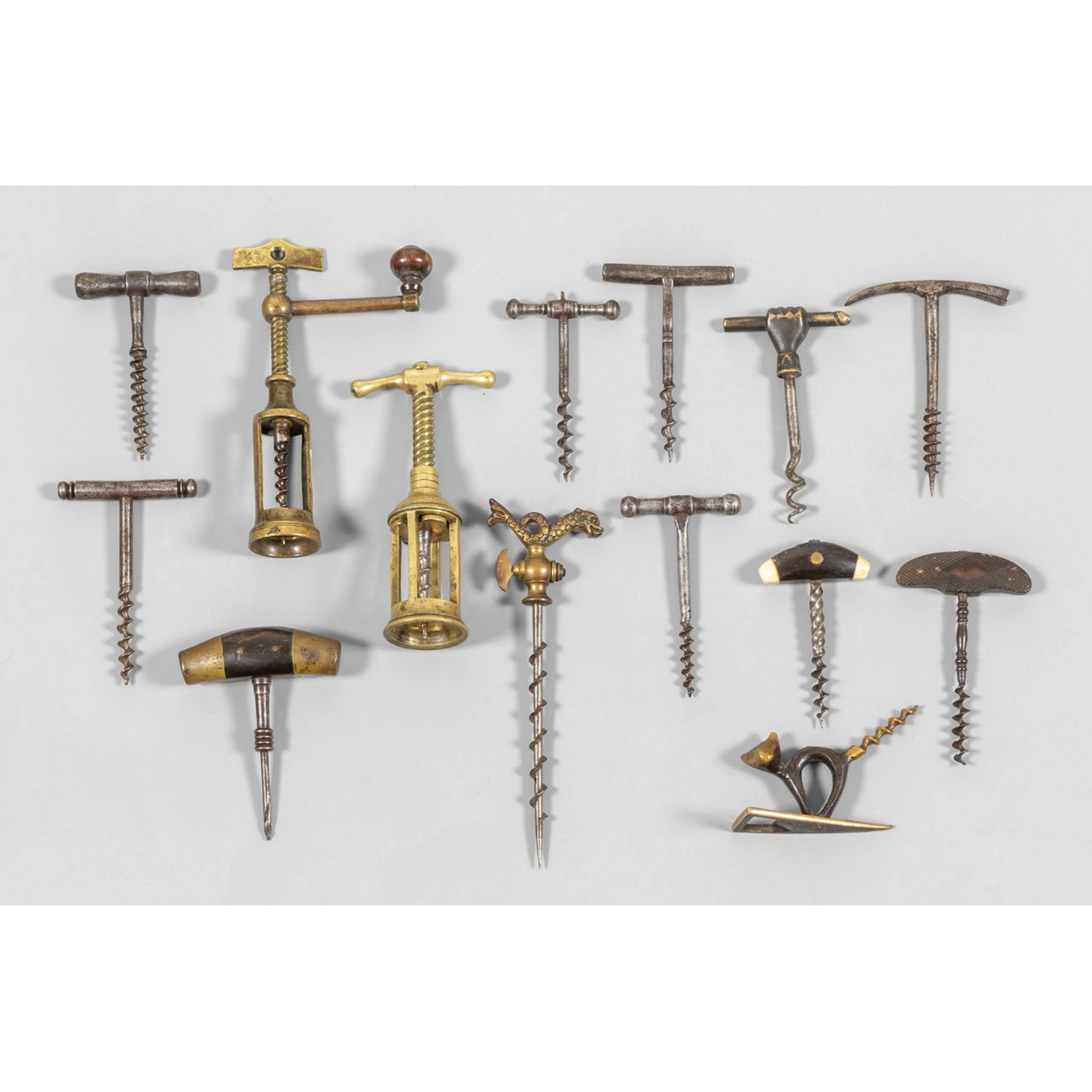 Quattordici cavatappi in ferro e bronzo, sec. XIX