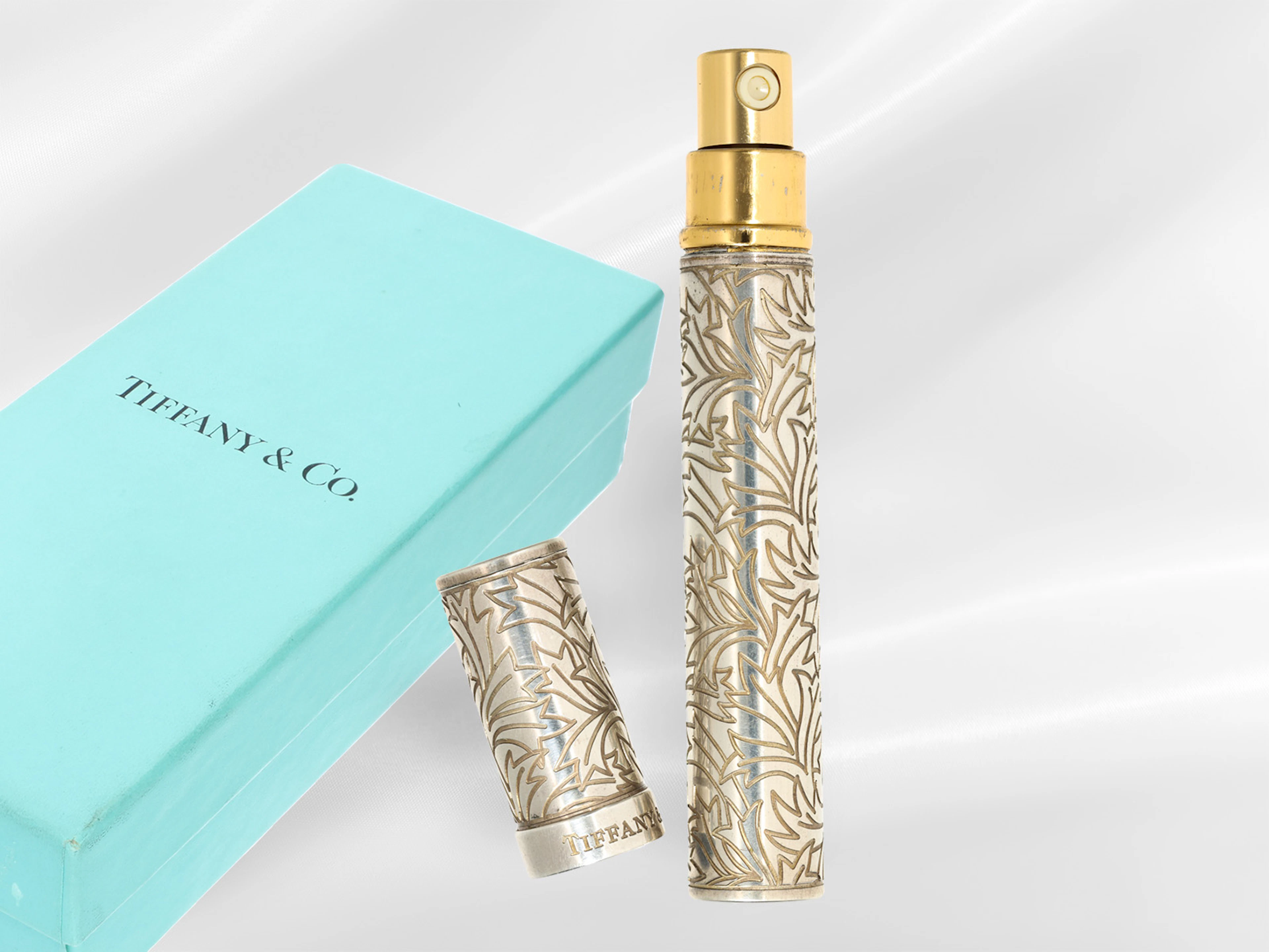 A beautiful silver perfume atomiser from Tiffany & Co, signed, with