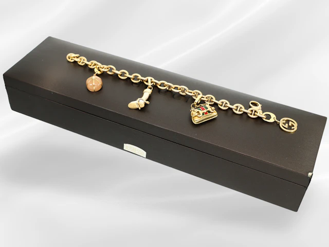 A highly decorative designer gold bracelet from Gucci, high-quality