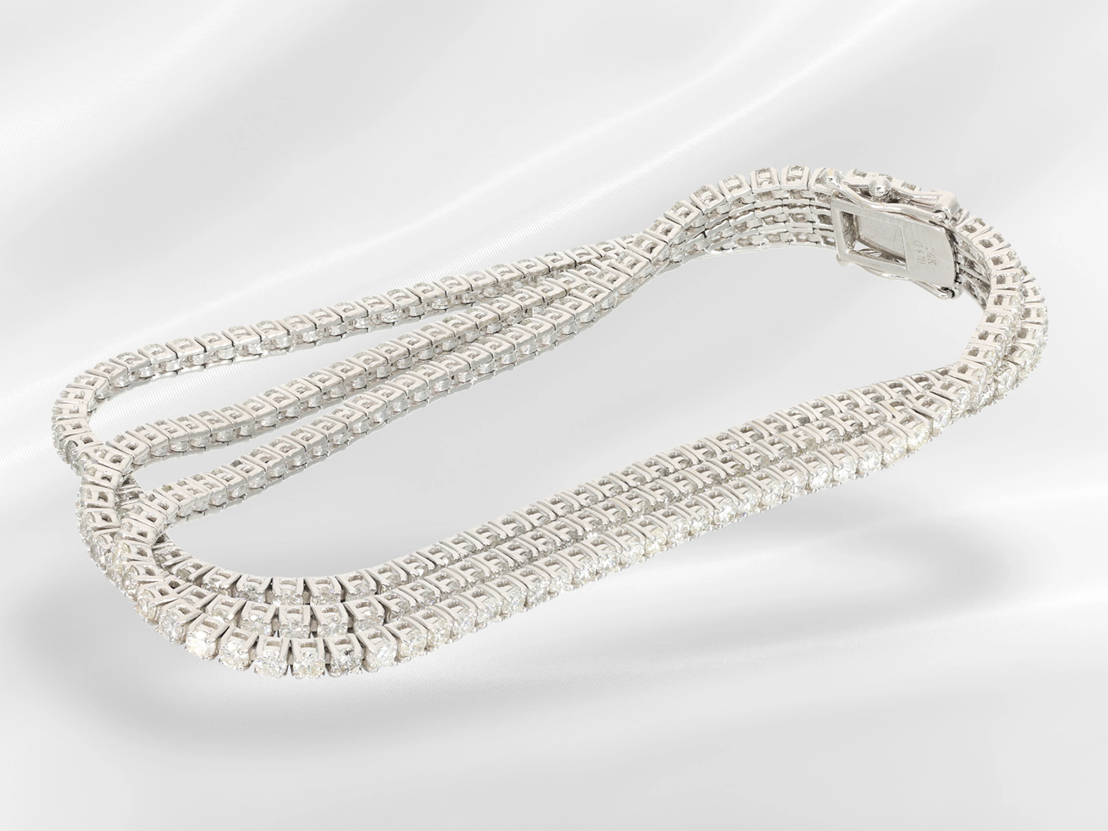 Bracelet: white gold bracelet as good as new and unworn, set with