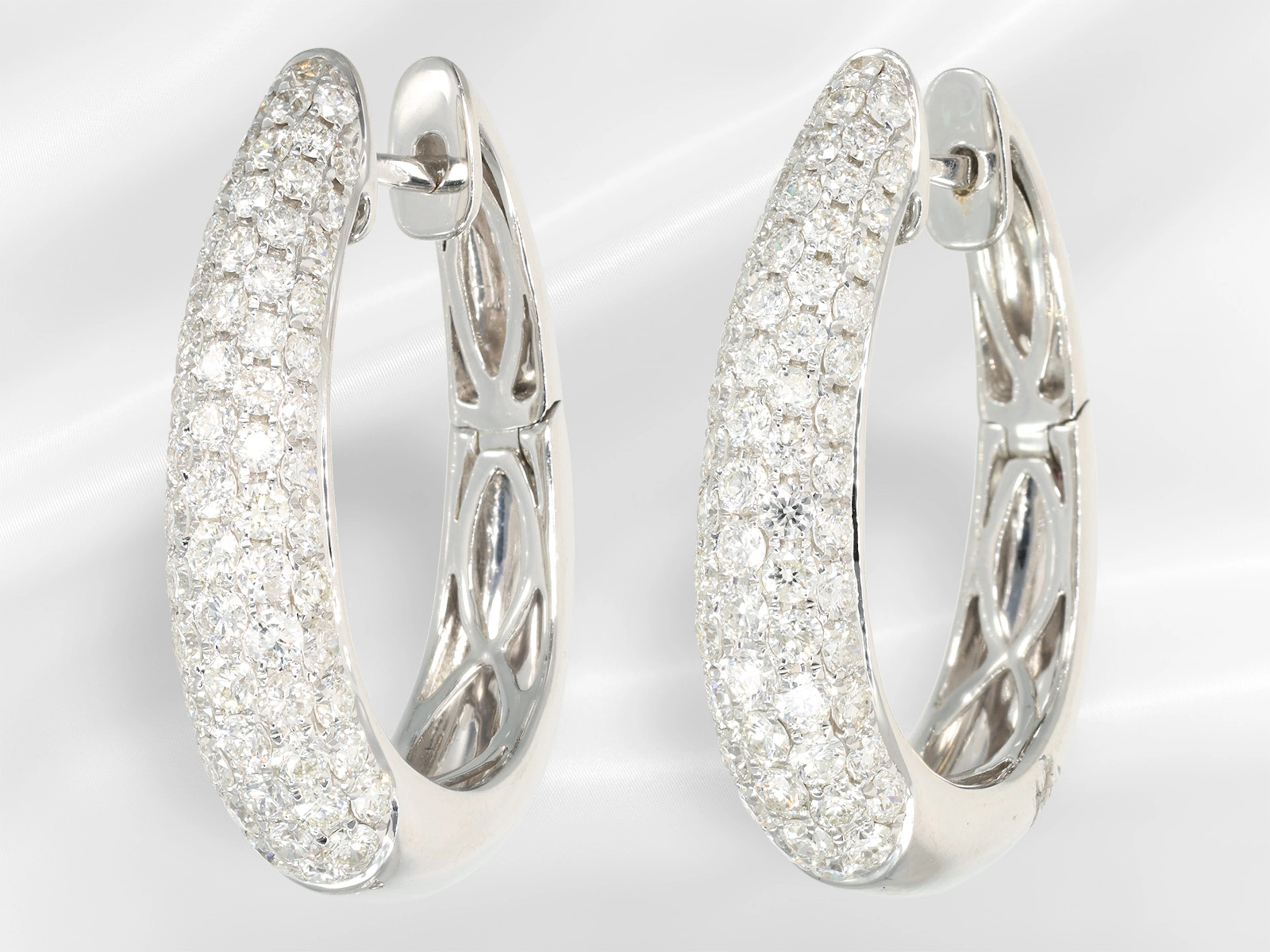 Earrings: elegant, attractive white gold brilliant-cut diamond hoop