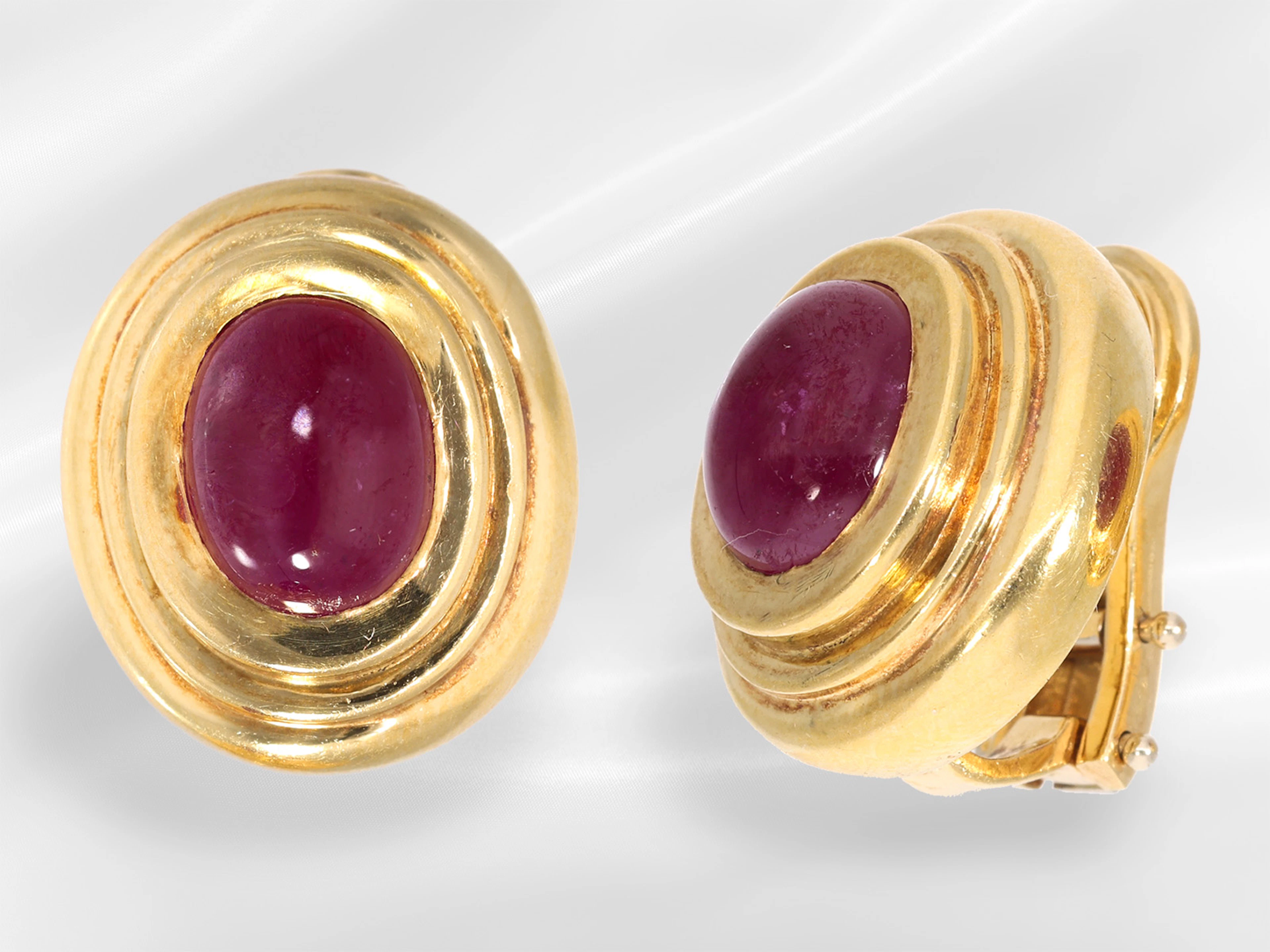 Earrings: solidly crafted vintage ear clips with ruby cabochons, 18K