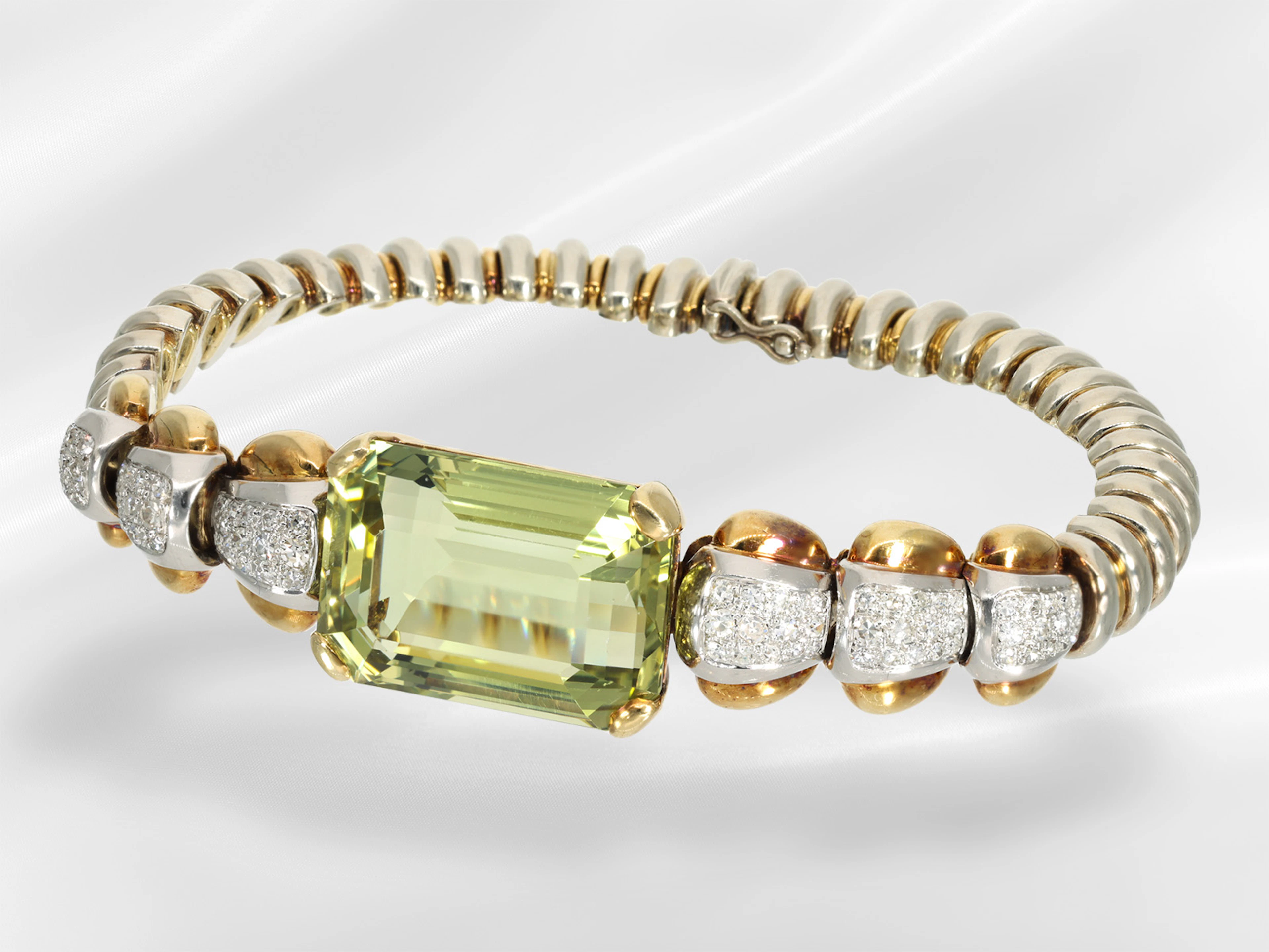 Bracelet: highly decorative Art Deco diamond and coloured gemstone bracelet