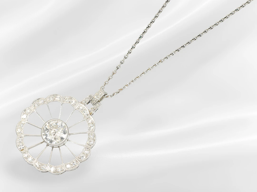 Pendant/necklace: antique platinum pendant with a large old-cut diamond