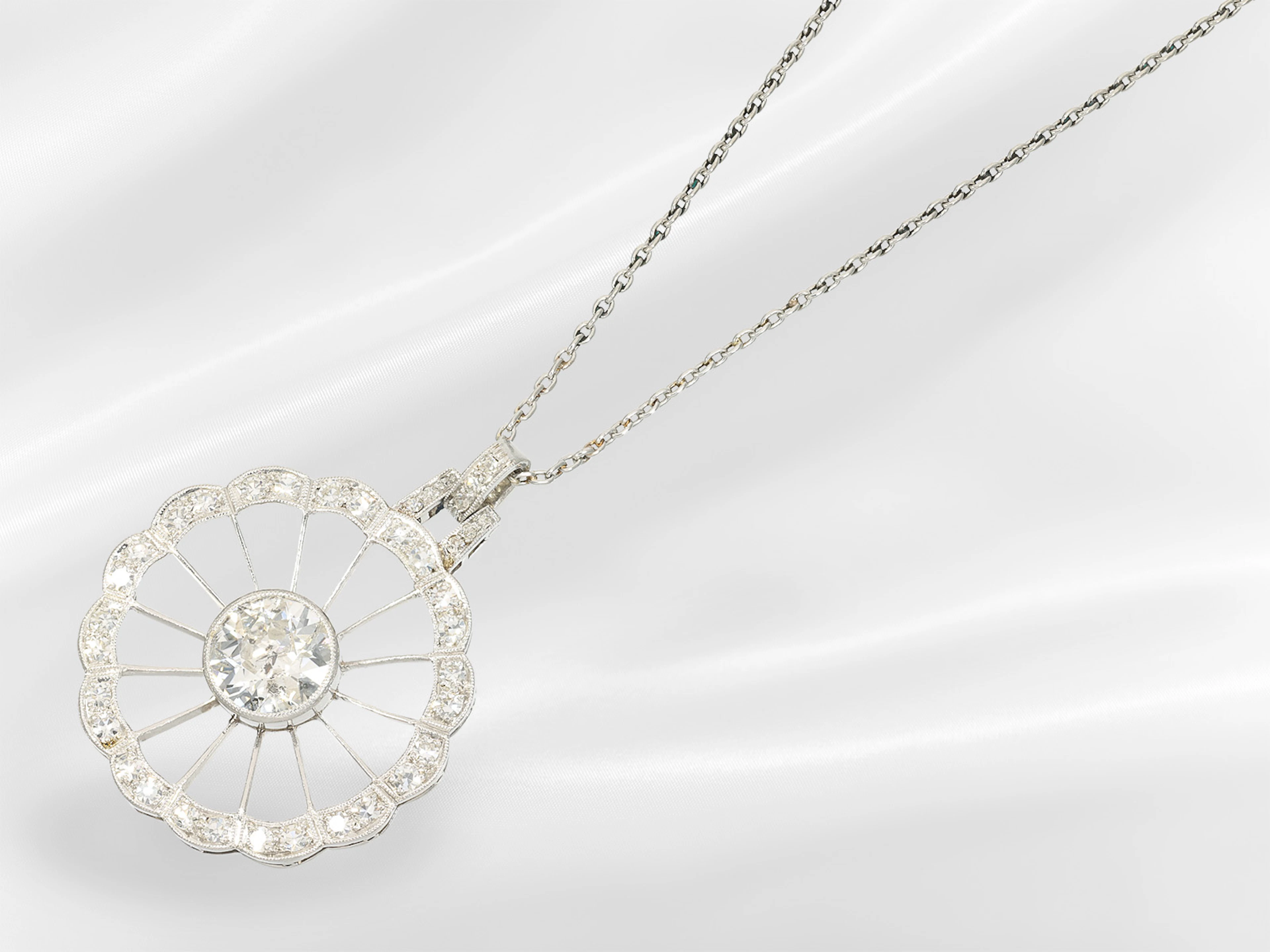 Pendant/necklace: antique platinum pendant with a large old-cut diamond