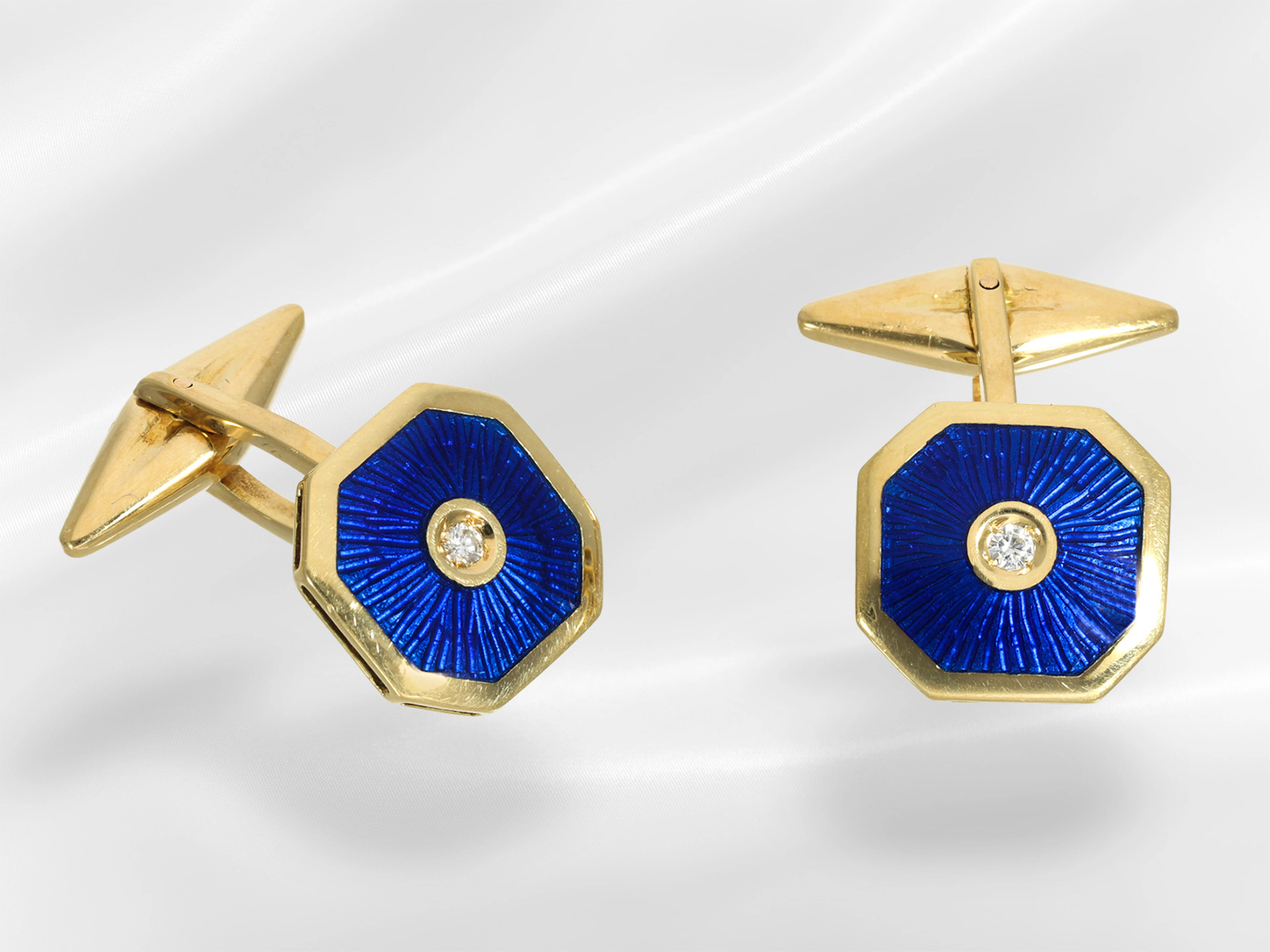 Golden, decorative cufflinks with fine enamel and diamond setting