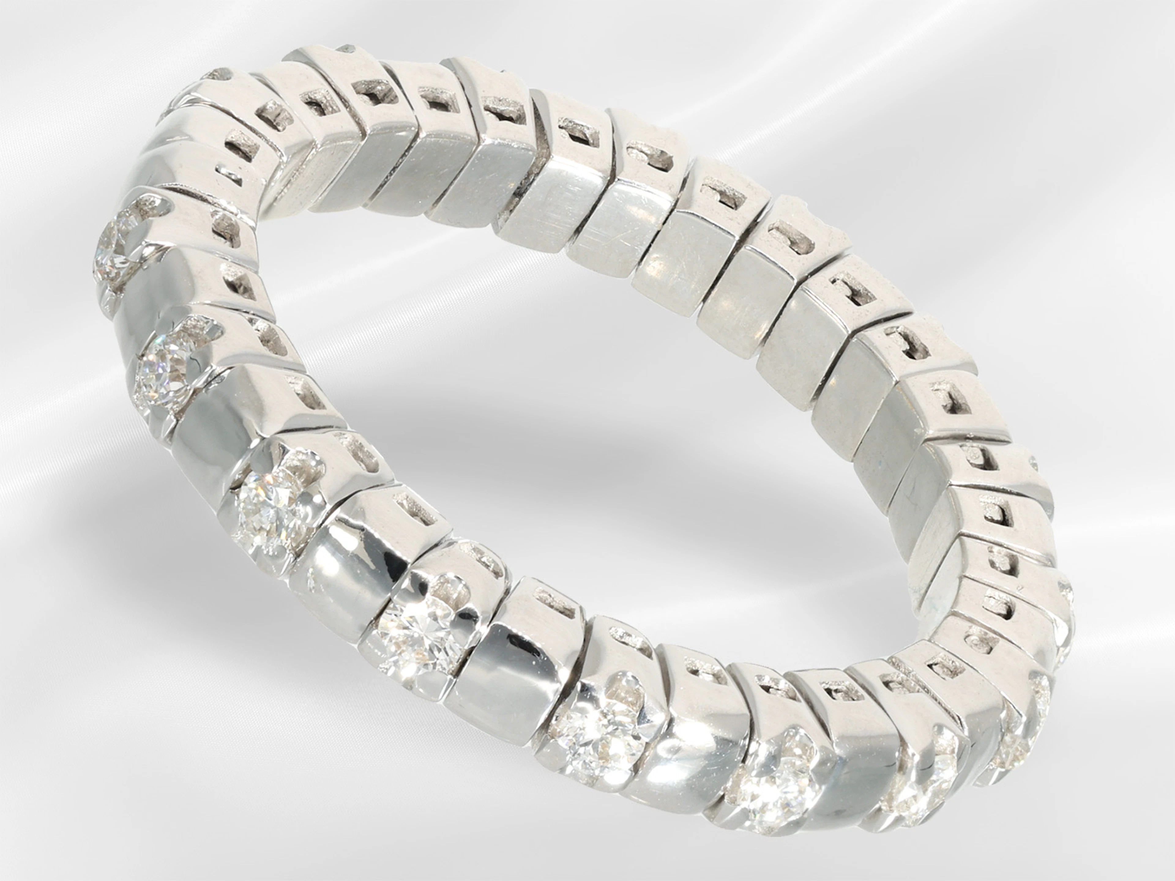 Ring: unusual, flexible Italian brilliant-cut diamond ‘memoir’ ring