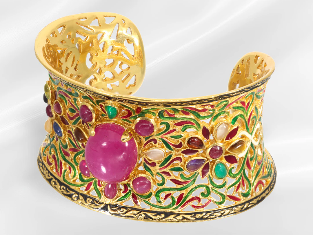 Open, exceptionally wide and very decorative ruby/coloured gemstone